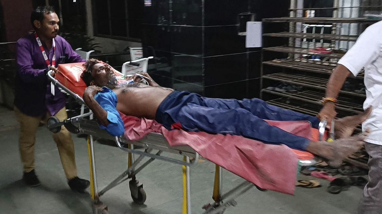 <div class="paragraphs"><p>A man is carried on a stretcher for treatment after falling sick from consuming spurious liquor in Botad.</p></div>