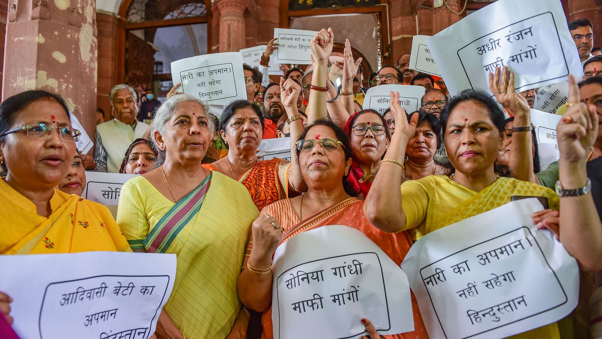 <div class="paragraphs"><p>Union Finance Minister Nirmala Sitharaman with other BJP MPs during a protest against Congress leader Adhir Ranjan Chowdhury's remarks on President Droupadi Murmu at Parliament House in New Delhi on Thursday, 28 July.</p></div>