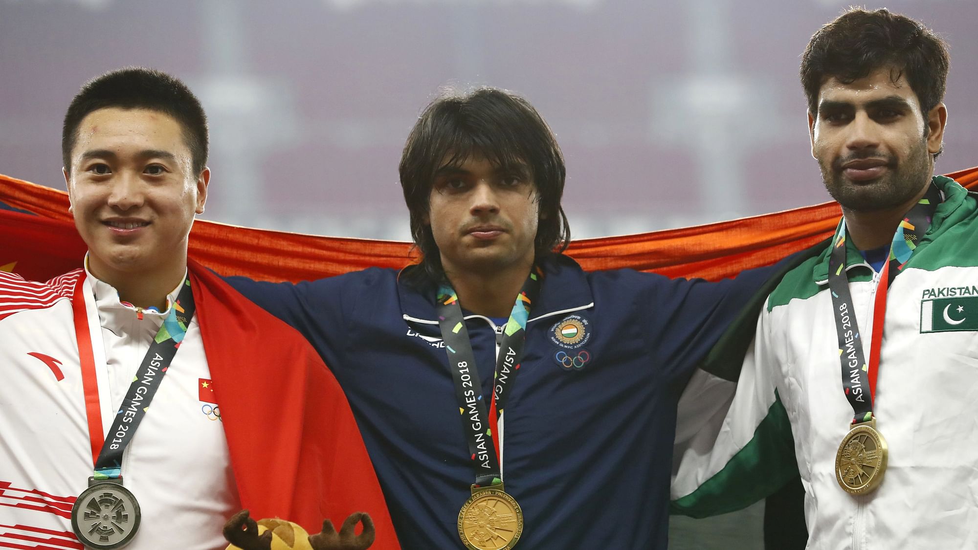 <div class="paragraphs"><p>India’s Neeraj Chopra alongside Pakistan’s Arshad Nadeem (extreme right) during the 2018 Asian Games in Jakarta.</p></div>