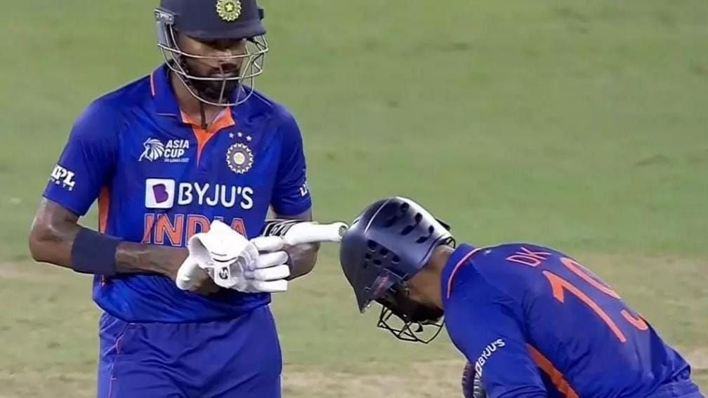 <div class="paragraphs"><p>Dinesh Karthik (right) bows down to Hardik Pandya following the latter's heroics that helped India beat Pakistan by five wickets in the Asia Cup Group A clash in Dubai.&nbsp;&nbsp;</p></div>