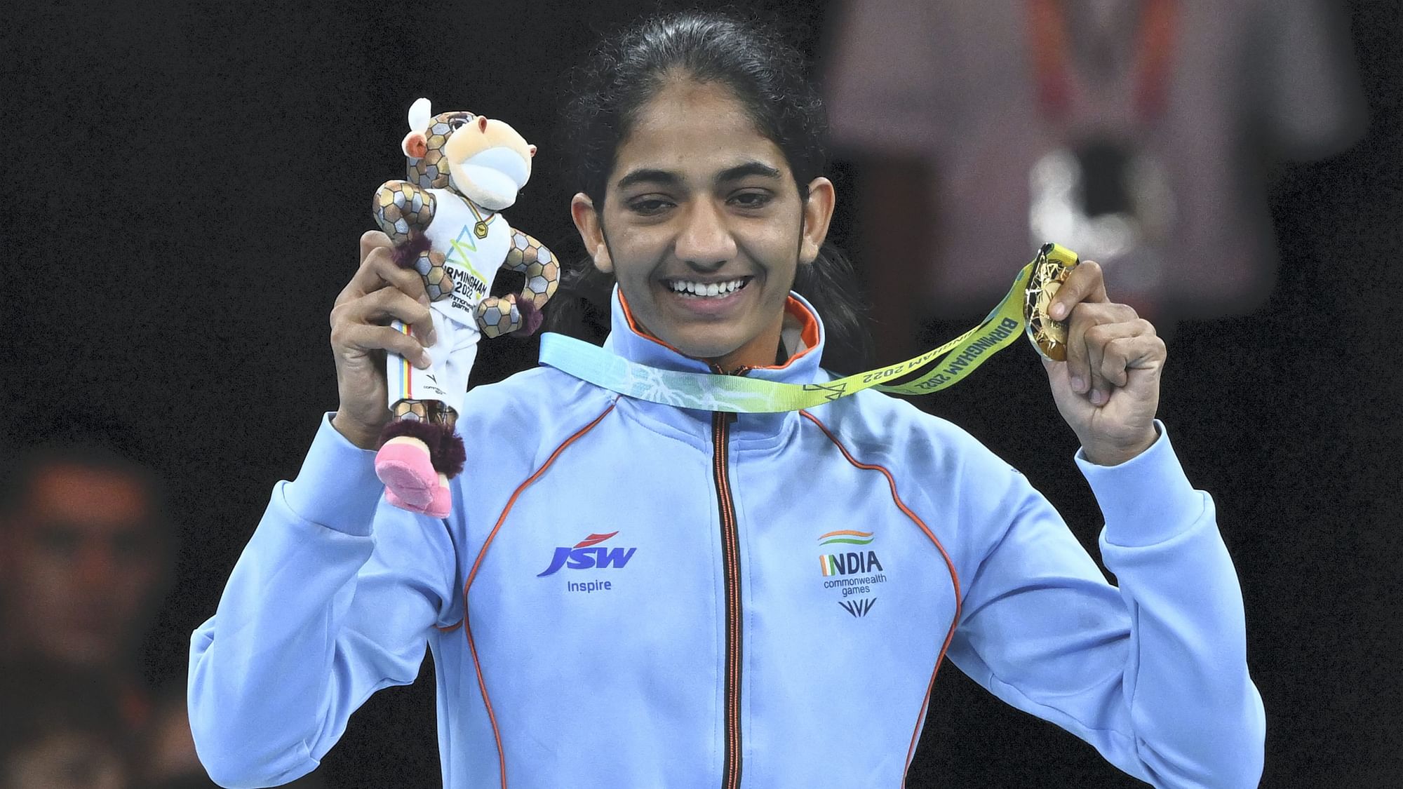 <div class="paragraphs"><p>India's Nitu Ghanghas poses with her gold medal after emerging winner in the women's over 45-48kg (minimumweight) boxing event at the 2022 Commonwealth Games in Birmingham on Sunday.</p></div>