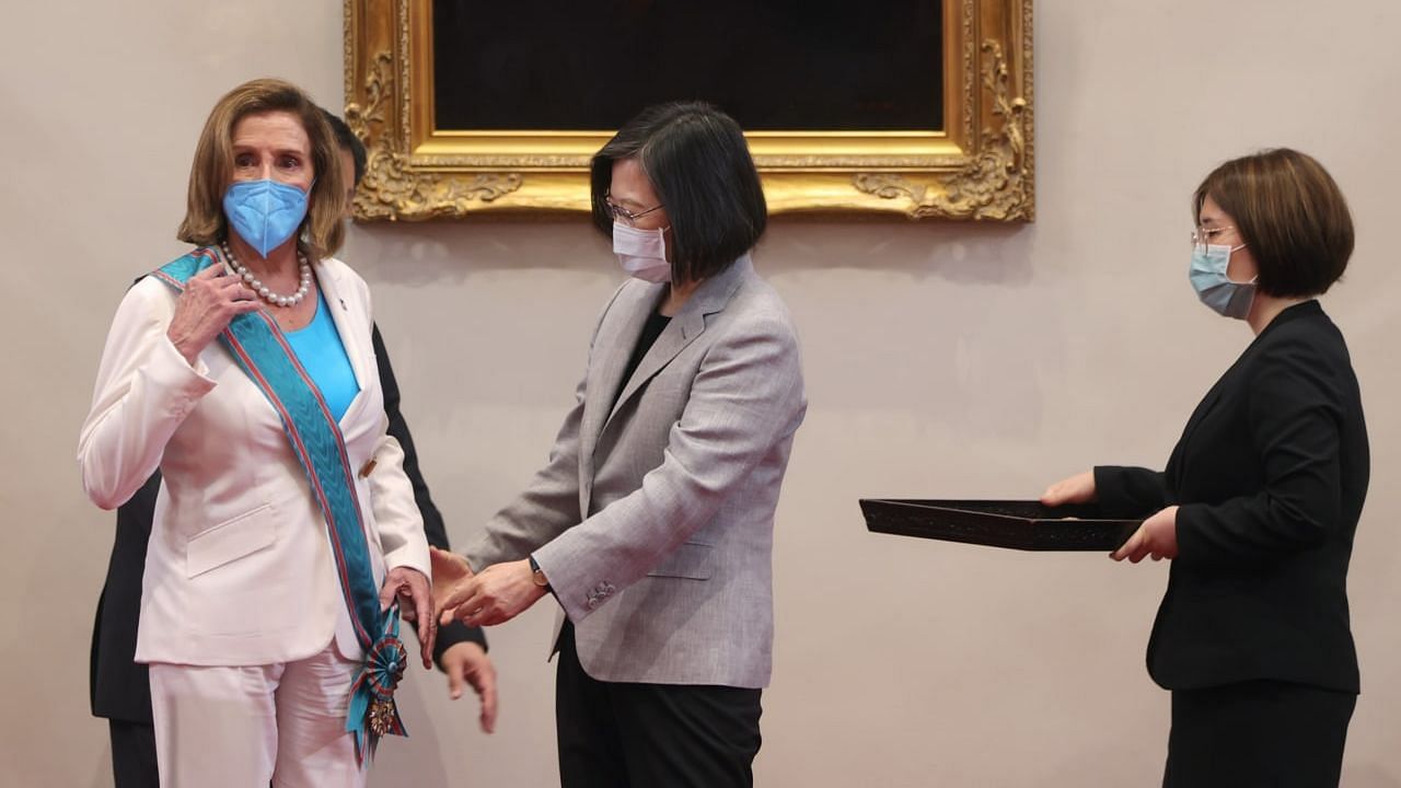 <div class="paragraphs"><p>United States House Speaker <a href="https://www.thequint.com/topic/nancy-pelosi">Nancy Pelosi</a> on Wednesday, 3 August, met Taiwanese President Tsai Ing-wen in Taipei, who awarded Pelosi with the Order of Propitious Clouds with Special Grand Cordon (Taiwan's highest civilian order), draping the blue sash over the US House Speaker.</p></div>