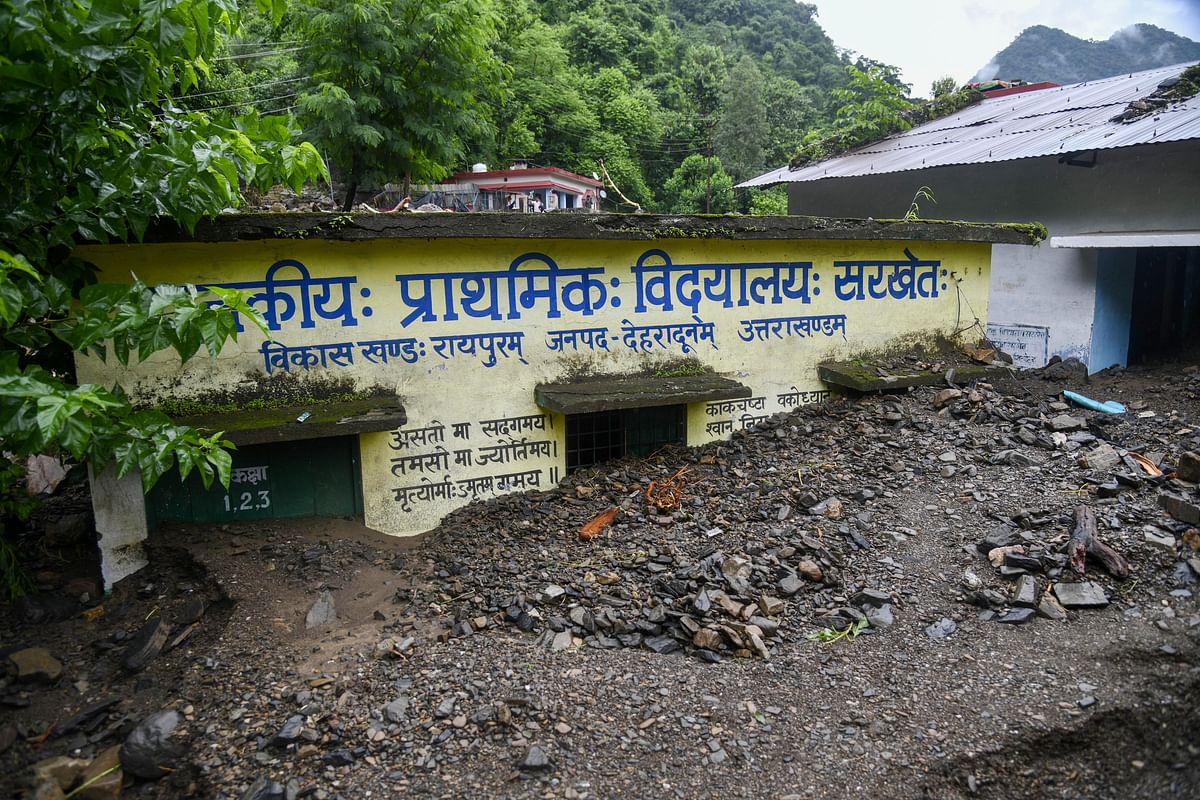 <div class="paragraphs"><p>Dehradun: A school buried under debris, after a series of cloudbursts hit different parts of Uttarakhand during the monsoon season, at Raipur area in Dehradun, on Saturday, 20 August.</p></div>