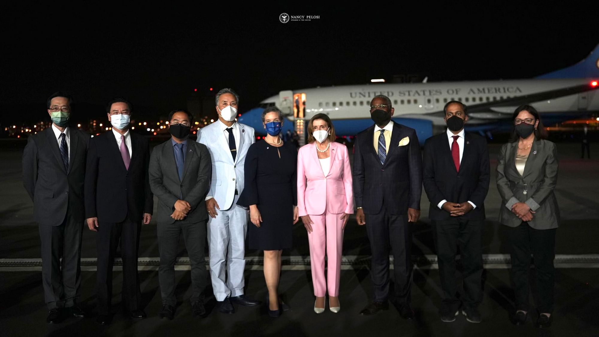 <div class="paragraphs"><p>US House Speaker Nancy Pelosi, center pose for photos after she arrives in Taipei, Taiwan, Tuesday, 2 August. Pelosi arrived in Taiwan on Tuesday night despite threats from Beijing of serious consequences, becoming the highest-ranking American official to visit the self-ruled island claimed by China in 25 years.</p></div>
