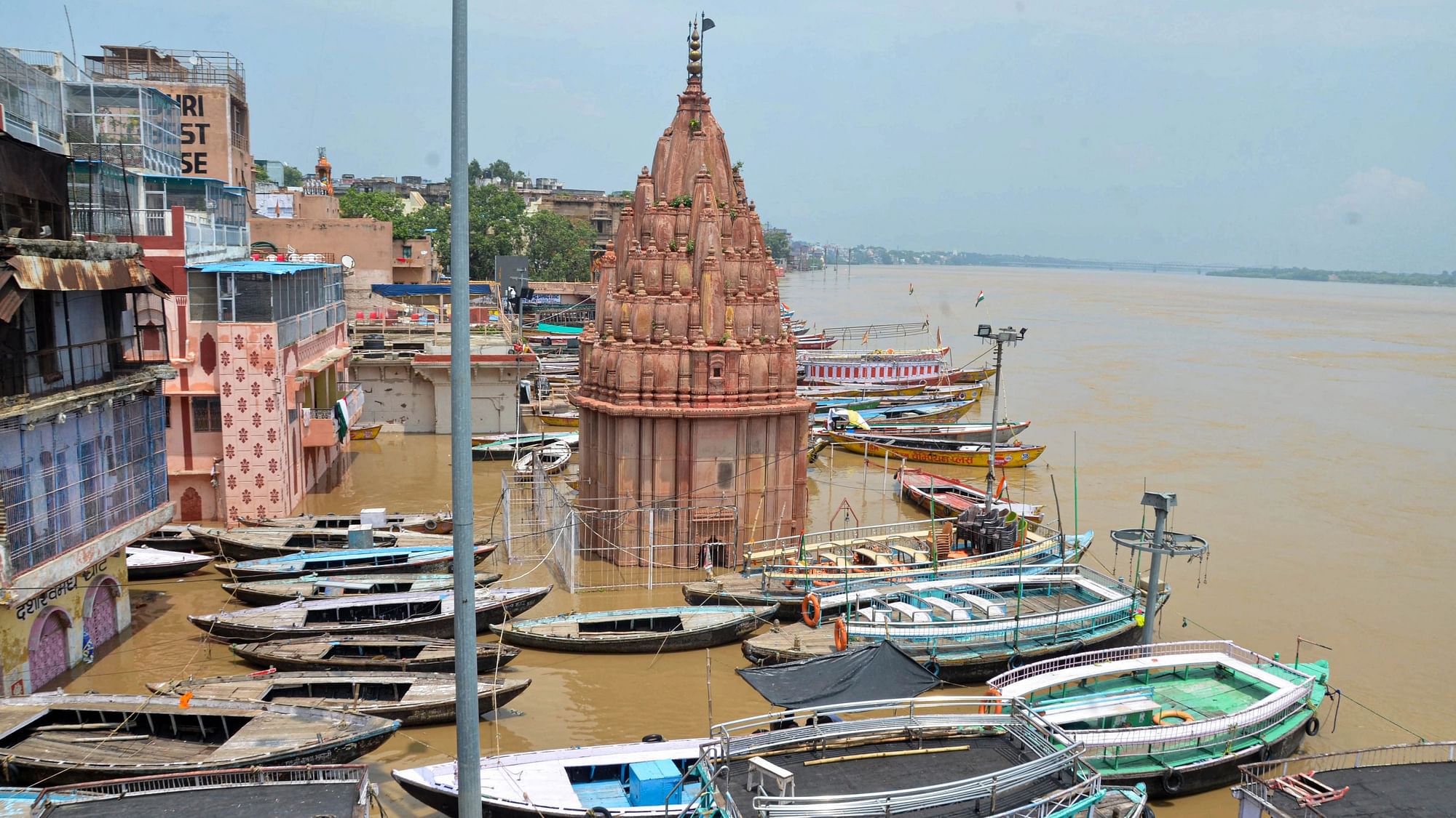 <div class="paragraphs"><p>Varanasi: Boats parked along the banks of the swollen Ganga river following monsoon rains, in Varanasi, Friday, 26 August.</p></div>