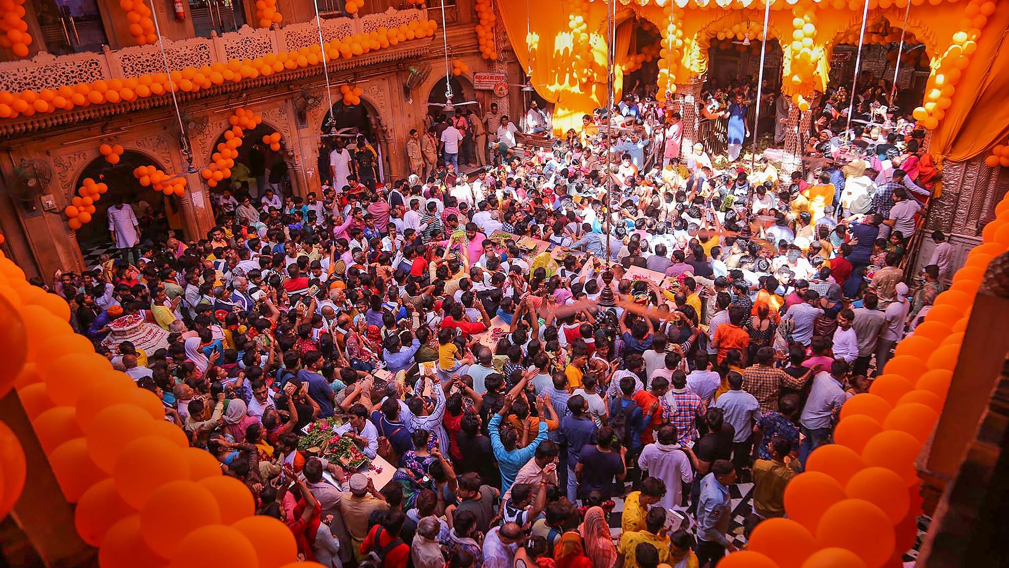<div class="paragraphs"><p>Devotees arrive to pay obesiance to Lord Bankey Bihari on the occasion of Janmashtami, at the Shri Bankey Bihari temple, in Vrindavan, Friday, 19 August, 2022.</p></div>
