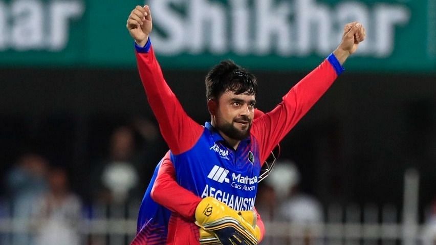 <div class="paragraphs"><p>Leg-spinner Rashid Khan celebrates after picking a wicket for Afghanistan in the Asia Cup 2022 Group B match against Bangladesh on Tuesday.&nbsp;</p></div>