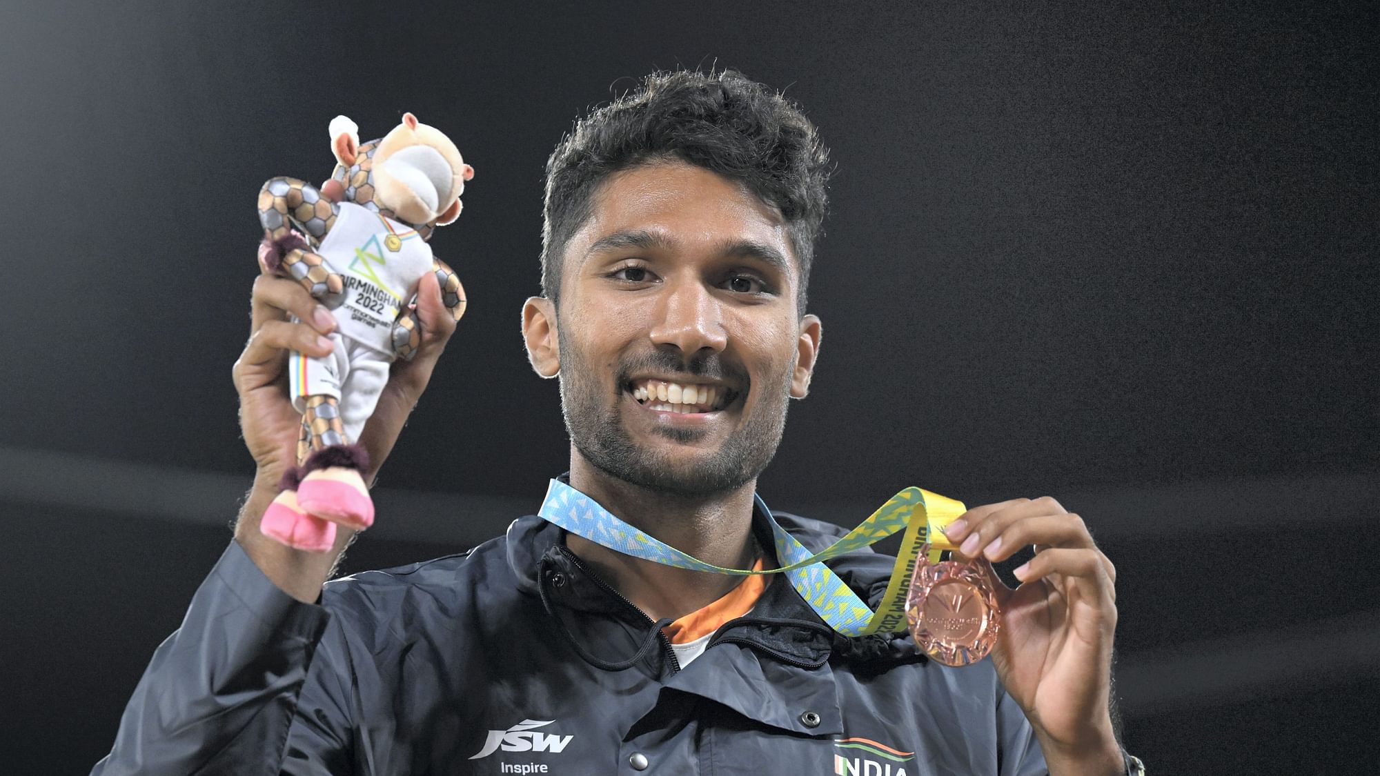 <div class="paragraphs"><p>India's Tejaswin Shankar celebrates after taking the bronze medal in the men's high jump at the 2022 Commonwealth Games in Birmingham.</p></div>