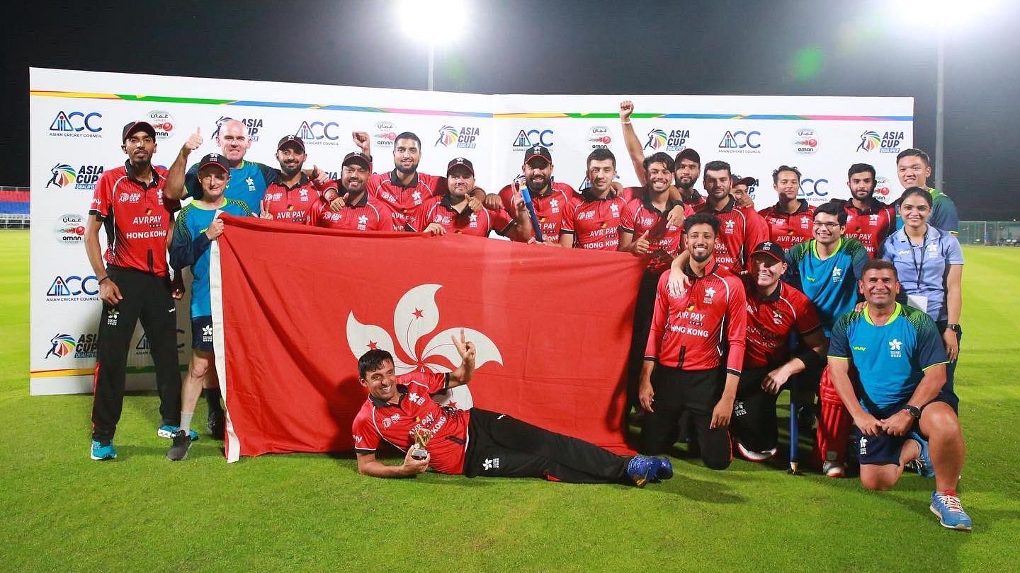 <div class="paragraphs"><p>The Hong Kong team members celebrate after ending the Qualifiers as the top-ranked side and securing a place in the Asia Cup 2022 main event.&nbsp;&nbsp;</p></div>