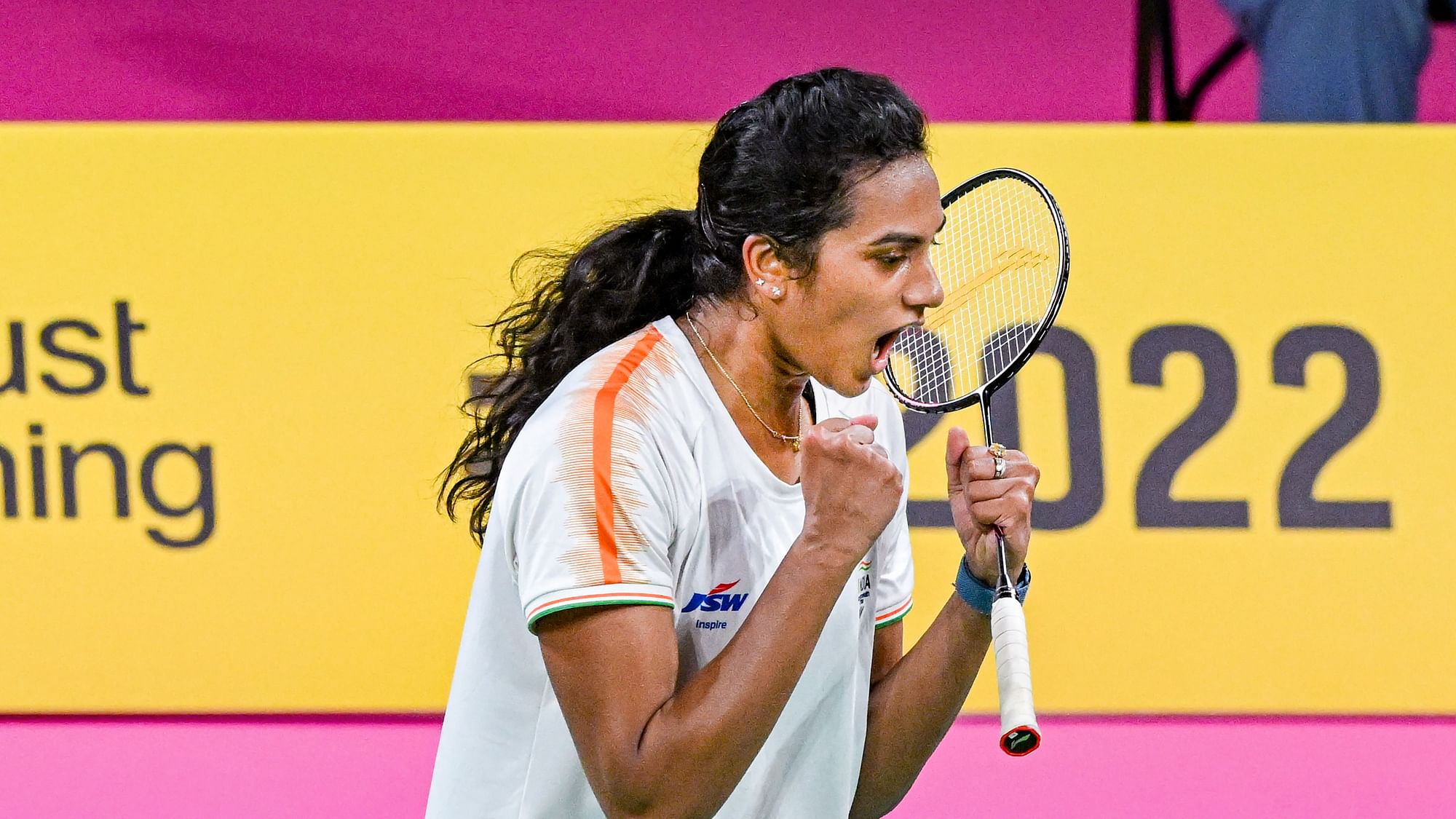 <div class="paragraphs"><p>India's PV Sindhu celebrates after winning gold in the women's singles badminton final at the 2022 Commonwealth Games in Birmingham on Monday.</p></div>