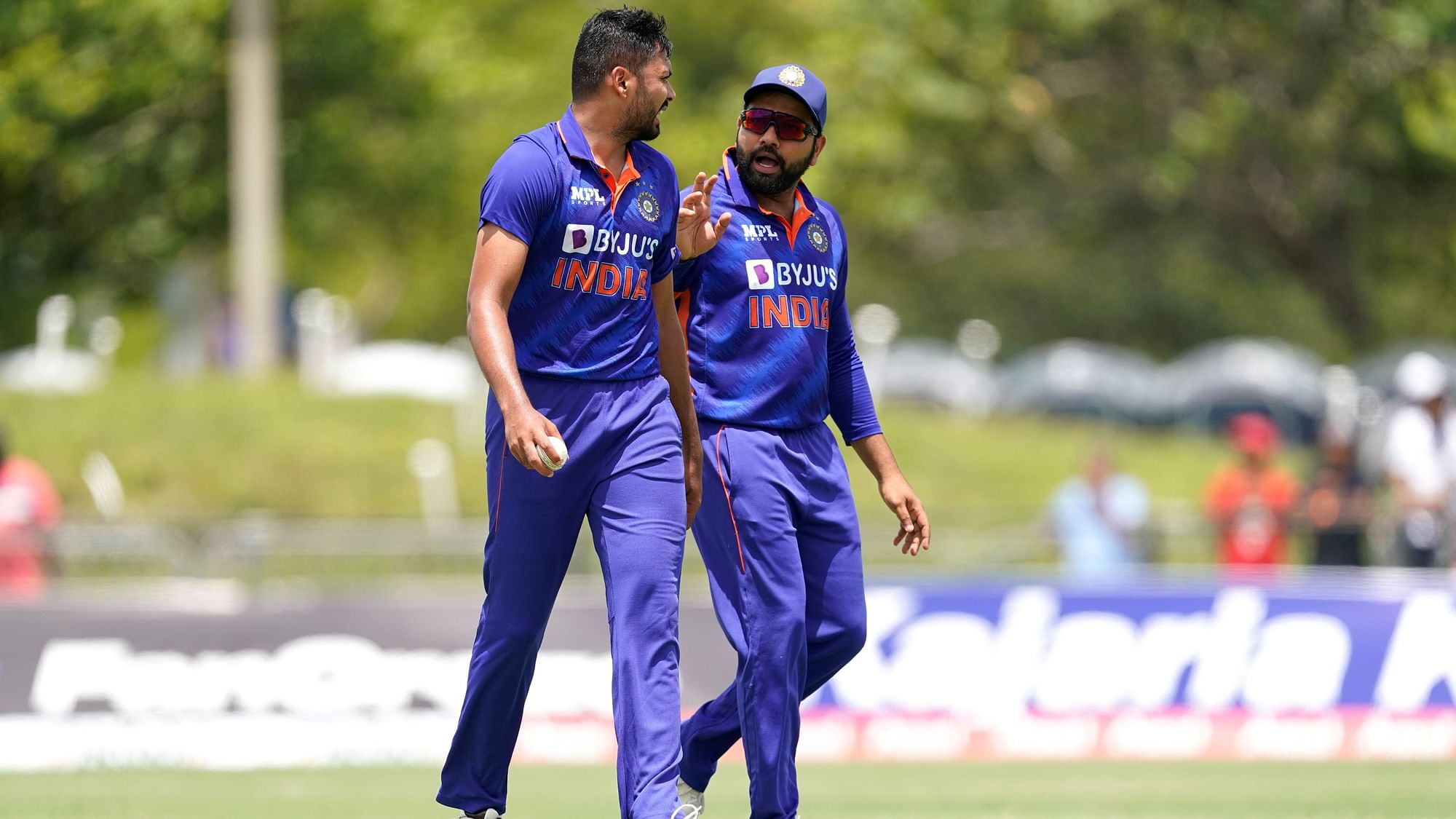<div class="paragraphs"><p>India bowler Avesh Khan (left) talks with captain Rohit Sharma during the fourth T20 cricket match against the West Indies on Saturday.</p></div>