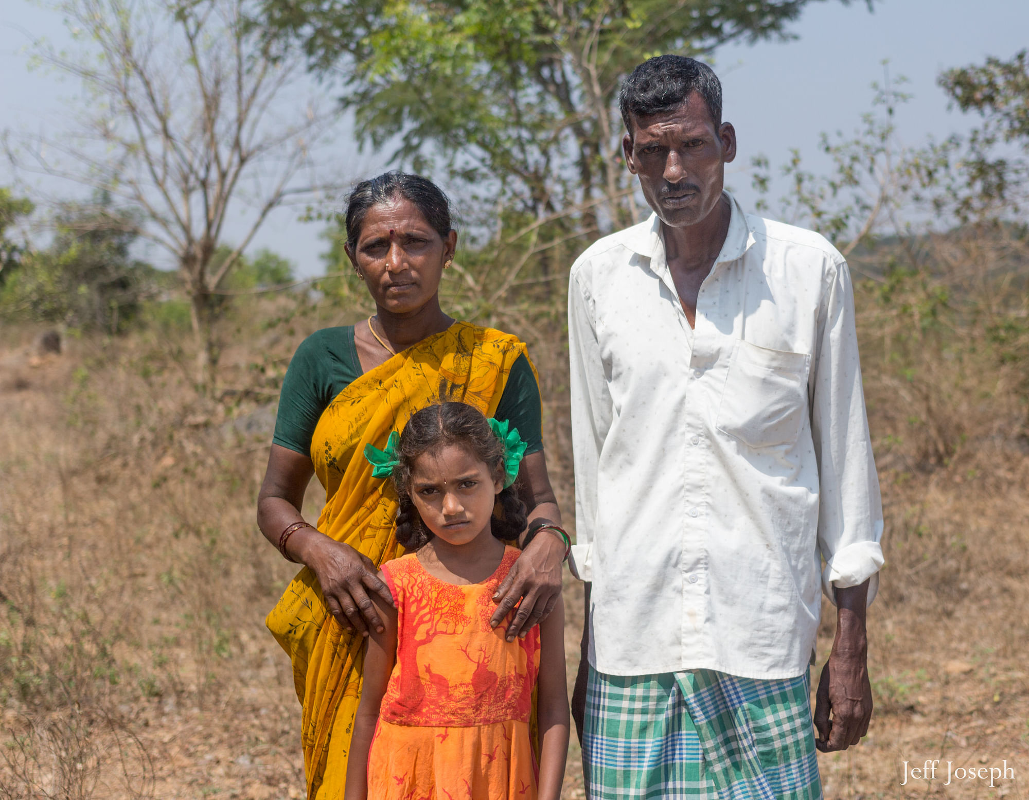 <div class="paragraphs"><p>Sivaraj, who belongs to the Irula tribe, with his wife Chinnama and daughter.</p></div>