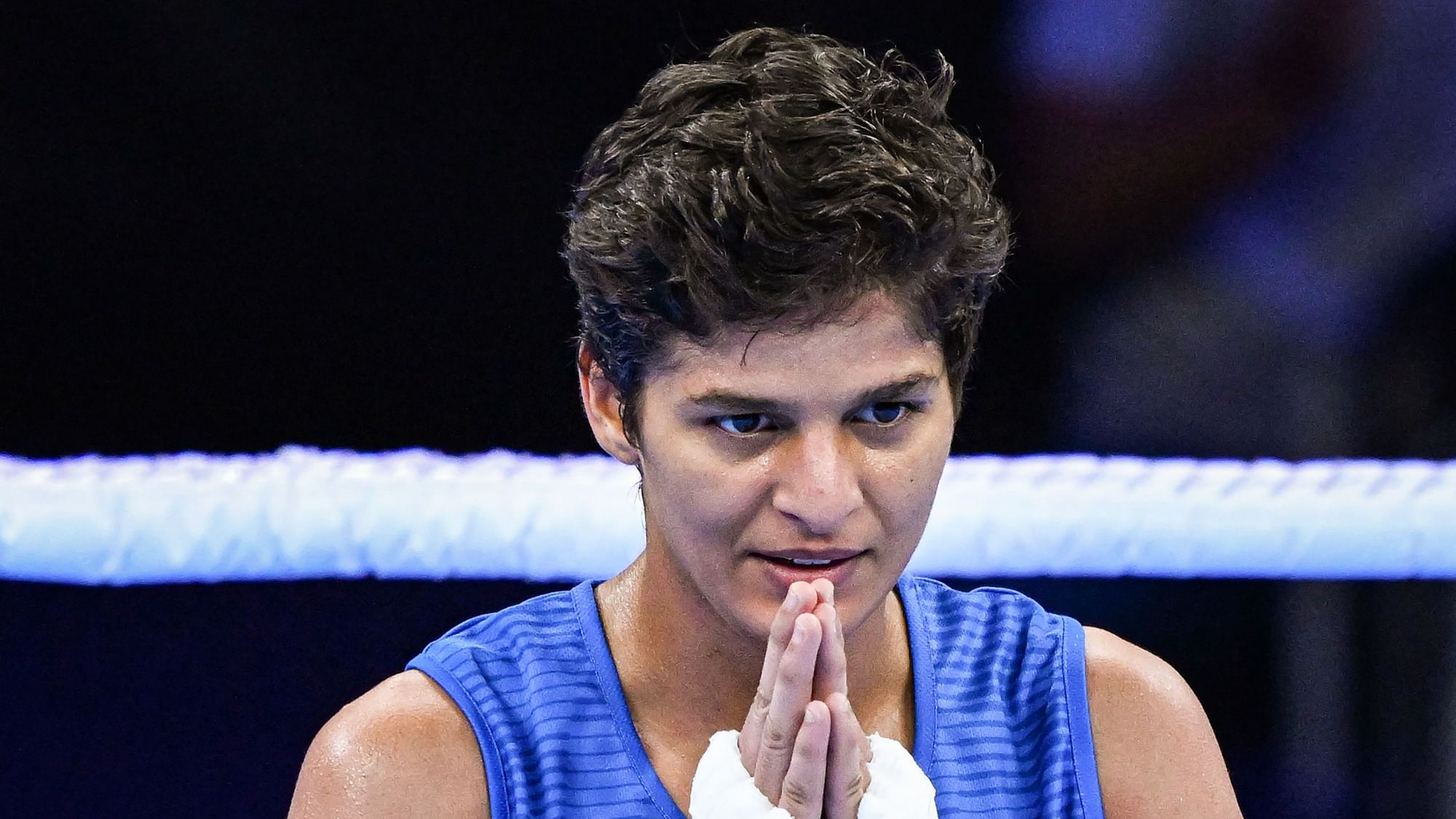 <div class="paragraphs"><p>India's Jaismine reacts after winning the quarterfinal boxing match of women's lightweight) category against New Zealand's Troy Garton at the 2022 Commonwealth Games in Birmingham on Thursday.</p></div>