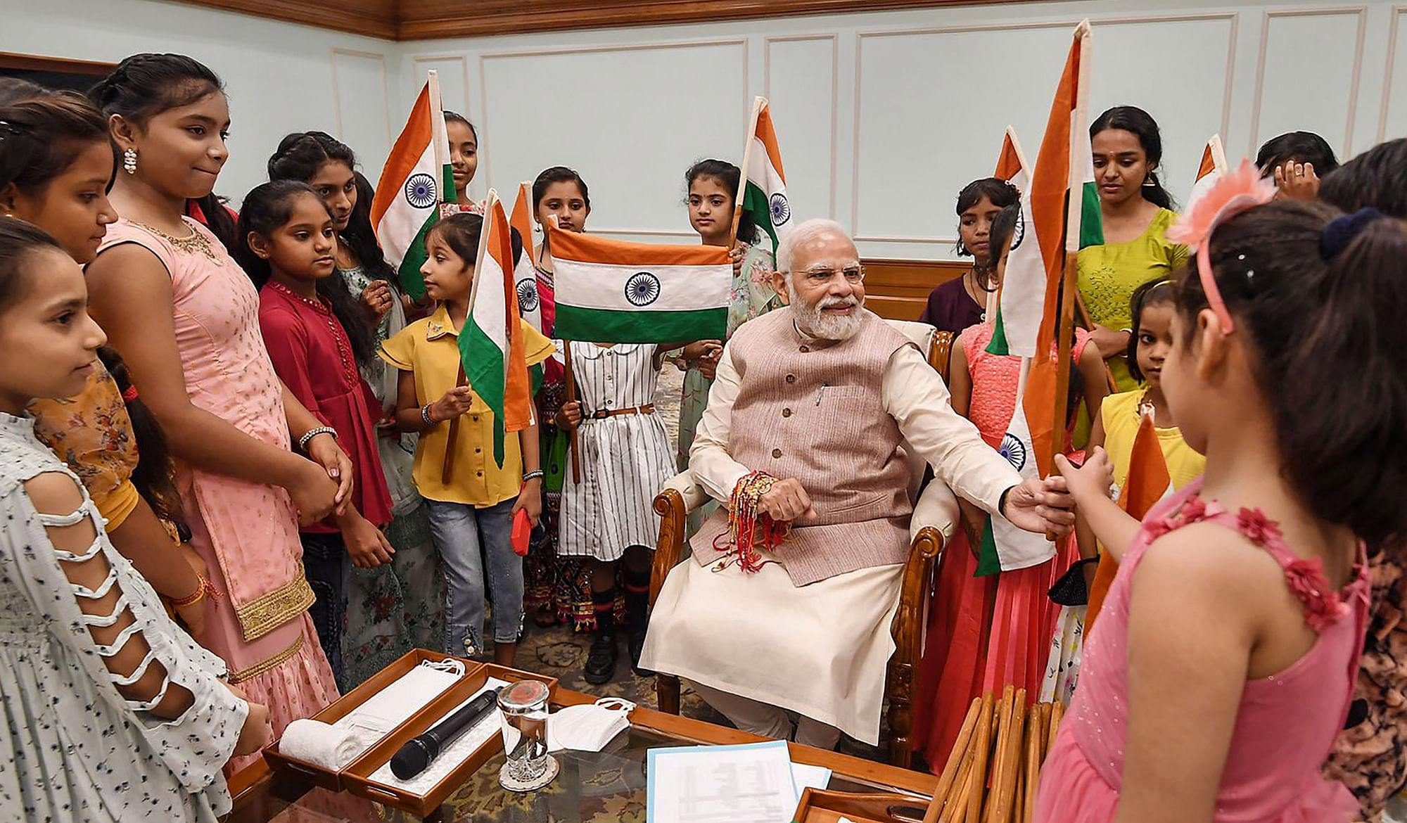 <div class="paragraphs"><p>Prime Minister Narendra Modi celebrated Raksha Bandhan with the daughters of PMO staff at his residence in New Delhi on Thursday, 11 August.</p></div>