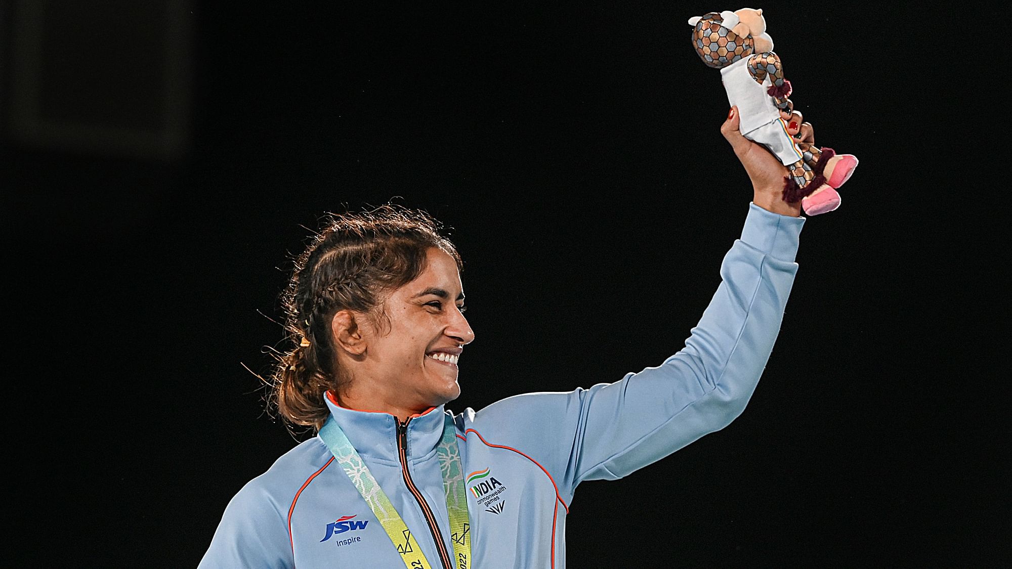 <div class="paragraphs"><p>Gold medallist Vinesh Phogat celebrates after winning the women's freestyle 53kg wrestling at the 2022 Commonwealth Games  (CWG) in Birmingham on Saturday.</p></div>
