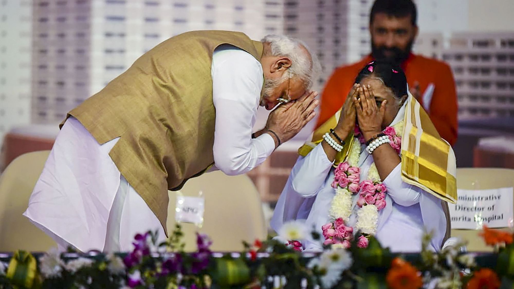 <div class="paragraphs"><p>Prime Minister Narendra Modi greets Mata Amritanandamayi during inauguration of state-of-the-art Amrita Hospital in Faridabad, Wednesday, 24 August.</p></div>