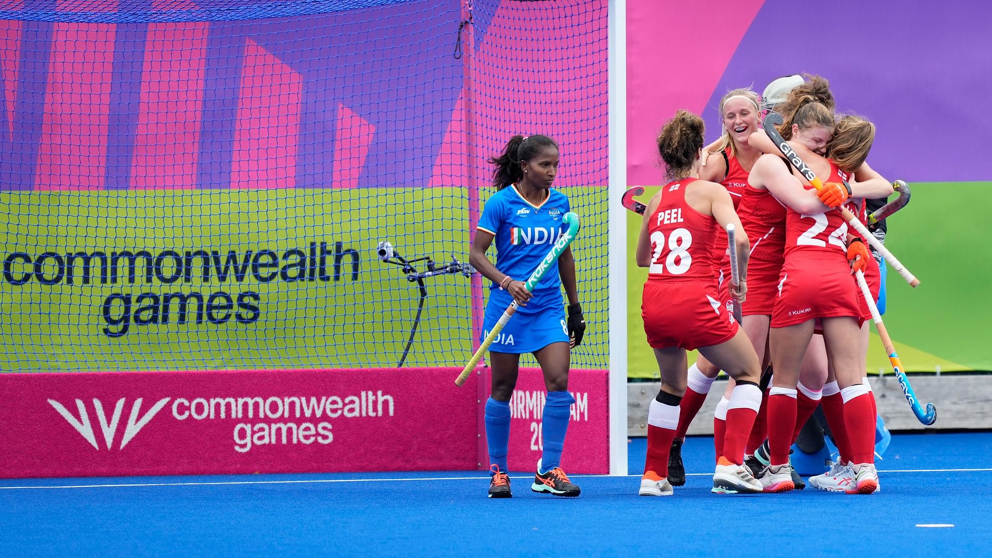 <div class="paragraphs"><p>England players celebrate after scoring their side's second goal during the women's Pool A hockey match against India at the 2022 Commonwealth Games in Birmingham on Tuesday.</p></div>