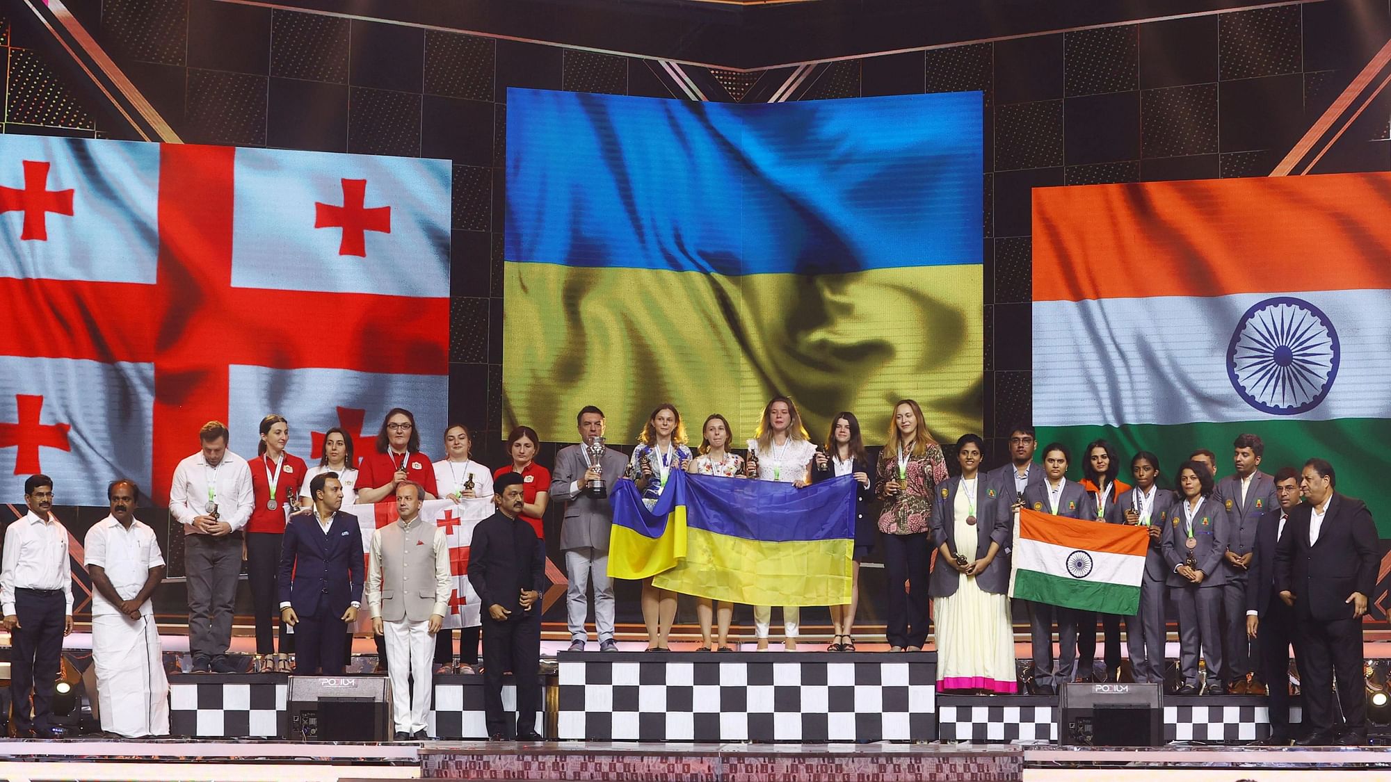 <div class="paragraphs"><p>Women's section bronze medallists India A team (right) with gold medallists Ukraine and silver medallists Georgia during the closing ceremony of the 44th Chess Olympiad in Chennai.&nbsp;</p></div>