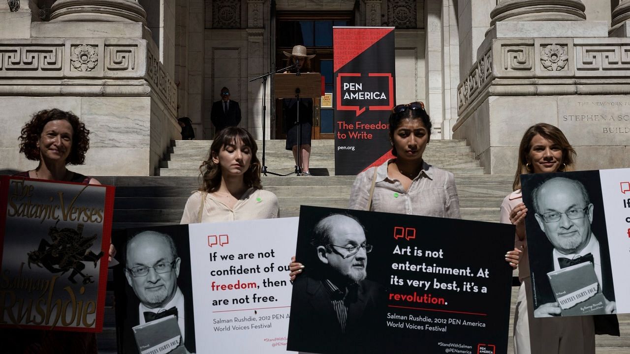 <div class="paragraphs"><p>A group of writers and supporters gather in solidarity in support of author Salman Rushdie outside the New York Public Library, Friday, 19 August 2022, in New York.</p></div>