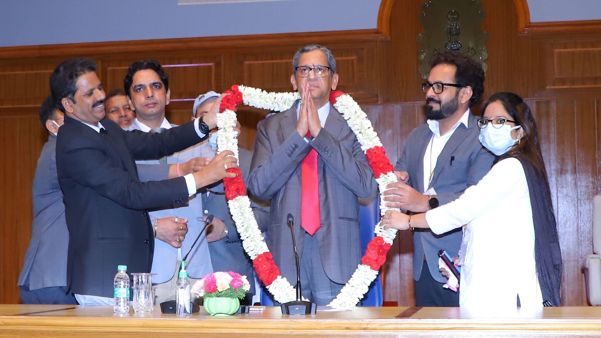 <div class="paragraphs"><p>Chief Justice of India NV Ramana being garlanded during a felicitation programme by the Supreme Court Employees Welfare Association, in New Delhi.</p></div>