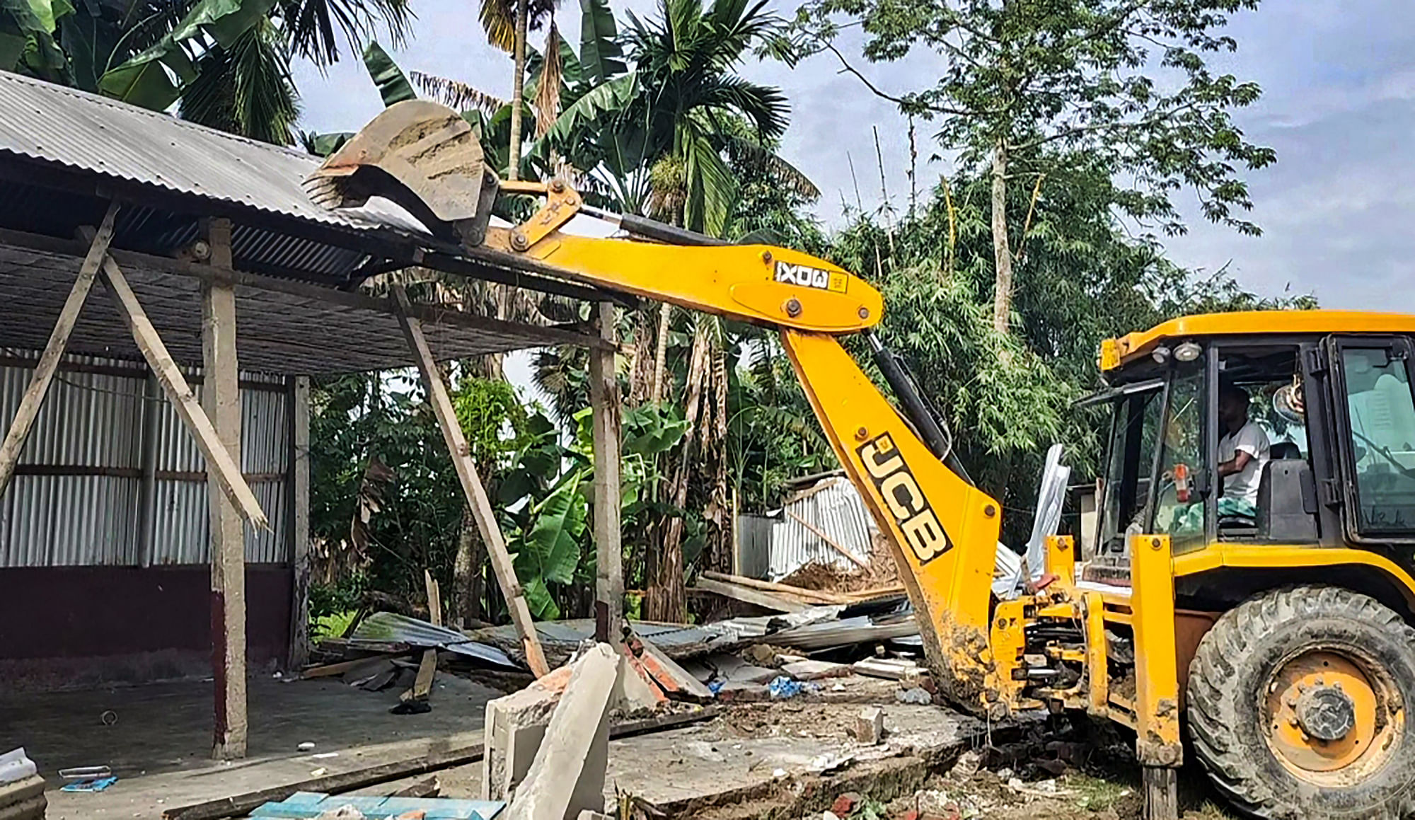 <div class="paragraphs"><p>Authorities  demolished the Jamiul Huda madrasa on Thursday, 4 August, of Mustafa alias Mufti Mustafa, who was recently arrested for his alleged links with a Bangladesh-based terror outfit.</p></div>