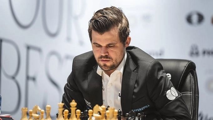 <div class="paragraphs"><p>Norwegian Magnus Carlsen grabbed the lead in the&nbsp;Julius Baer Generation Cup chess tournament after beating India's Arjun Erigaisi on Wednesday.&nbsp;</p></div>