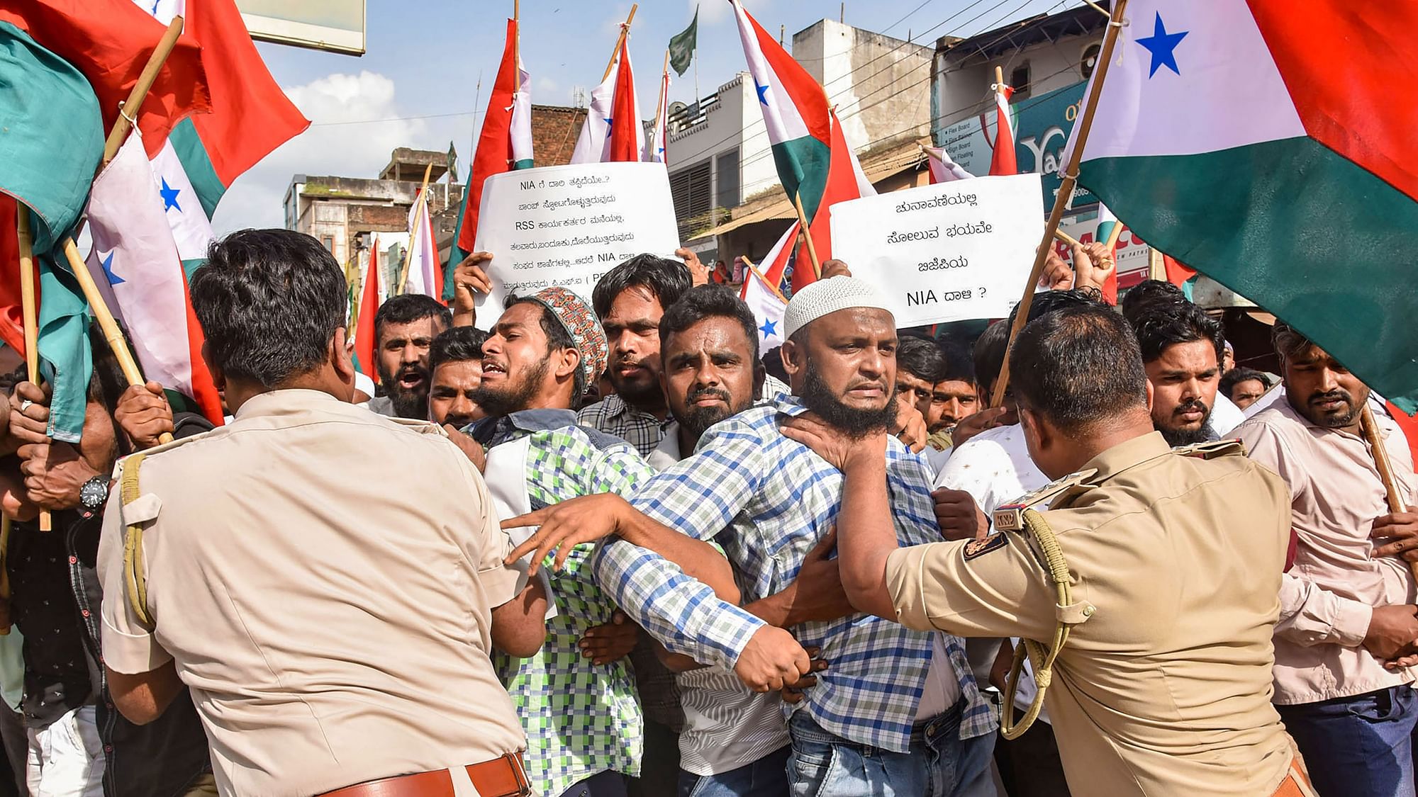 <div class="paragraphs"><p>Police attempted to detain Popular Front of India and Social Democratic Party of India workers during a protest against the raids by the National Investigation Agency in Karnataka's Hubballi on Thursday, 22 September.&nbsp;</p></div>