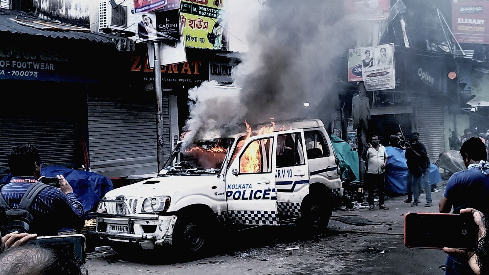 <div class="paragraphs"><p>The PCR vehicle on fire during the BJP protests on Tuesday, 14 September</p></div>
