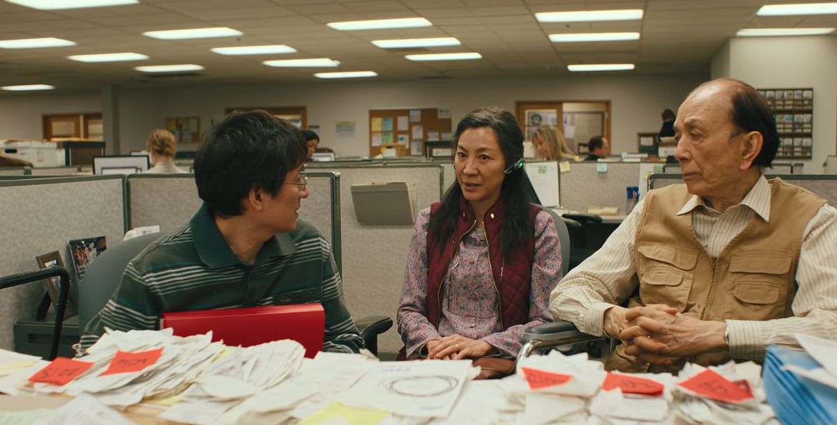 Michelle Yeoh's Evelyn, once consumed by the hopes of being a singer, is worn down by the immigrant American dream.
