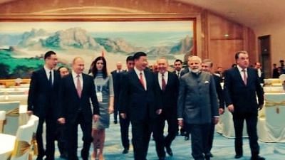 <div class="paragraphs"><p>Chinese President Xi Jinping with Prime Minister Narendra Modi, Uzbekistan President Shavkat Mirziyoyev, Russian President Vladimir Putin and other leaders of Shanghai Cooperation Organisation (SCO) member countries at the banquet hosted by him, in Qingdao, China on June 9, 2018.</p></div>