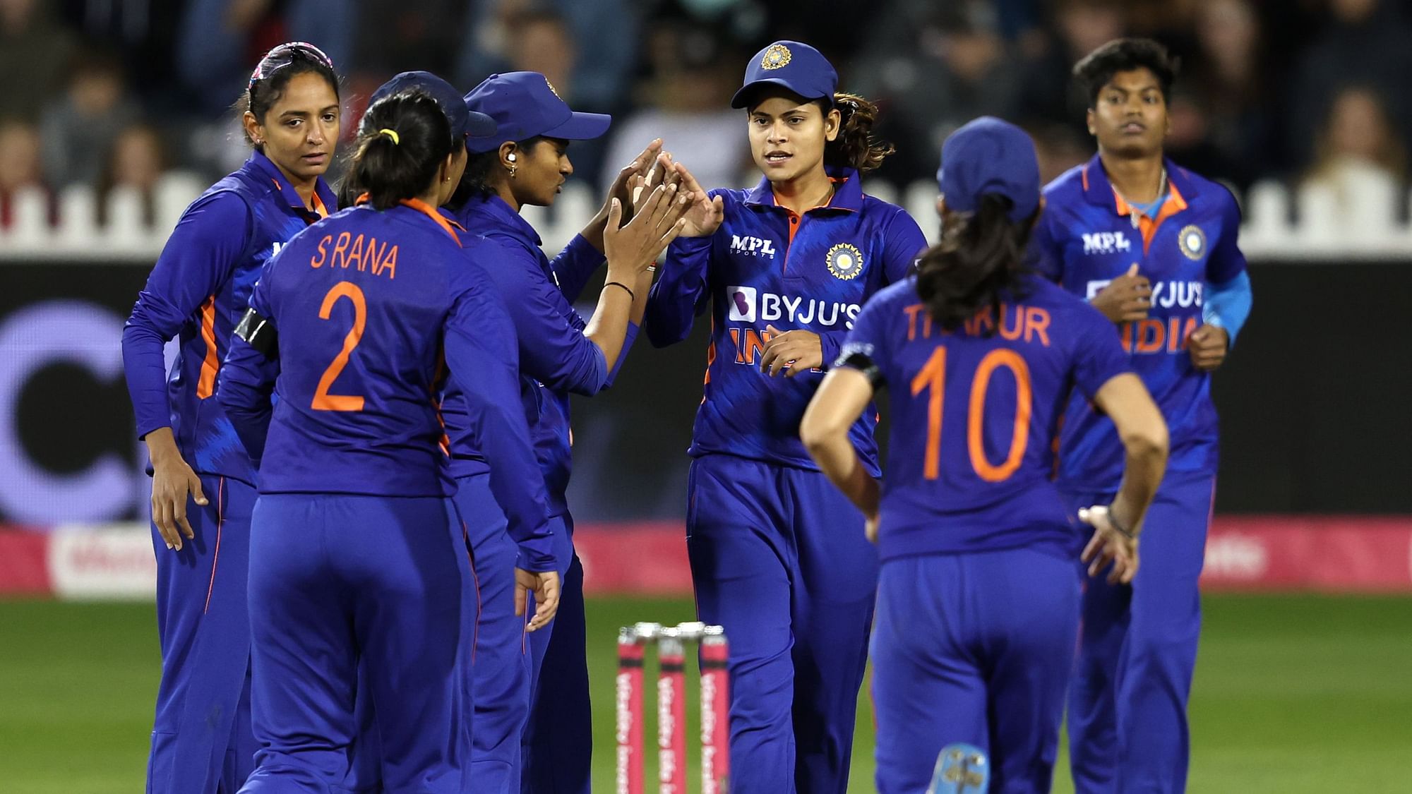 <div class="paragraphs"><p>The Indian women's team players celebrate after taking a wicket in the third T20I against England.&nbsp;</p></div>