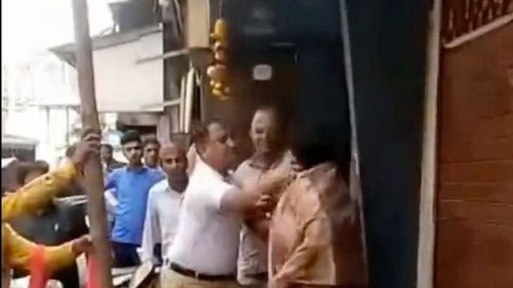 <div class="paragraphs"><p>MNS functionary Vinod Argile slapped and shoved Bohra after she objected to a bamboo pole being erected by MNS workers to display a poster, welcoming visitors to the local Ganpati mandal.</p></div>