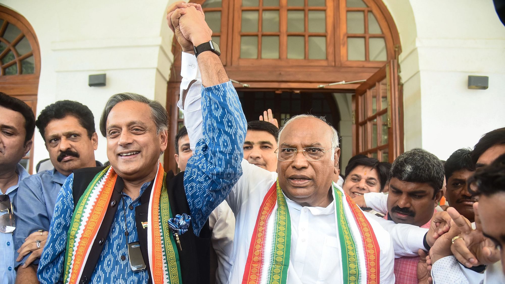 <div class="paragraphs"><p>New Delhi: Congress MP Shashi Tharoor congratulates newly elected Congress president Mallikarjun Kharge at the latter's residence in New Delhi, on Wednesday, 19 October.</p></div>