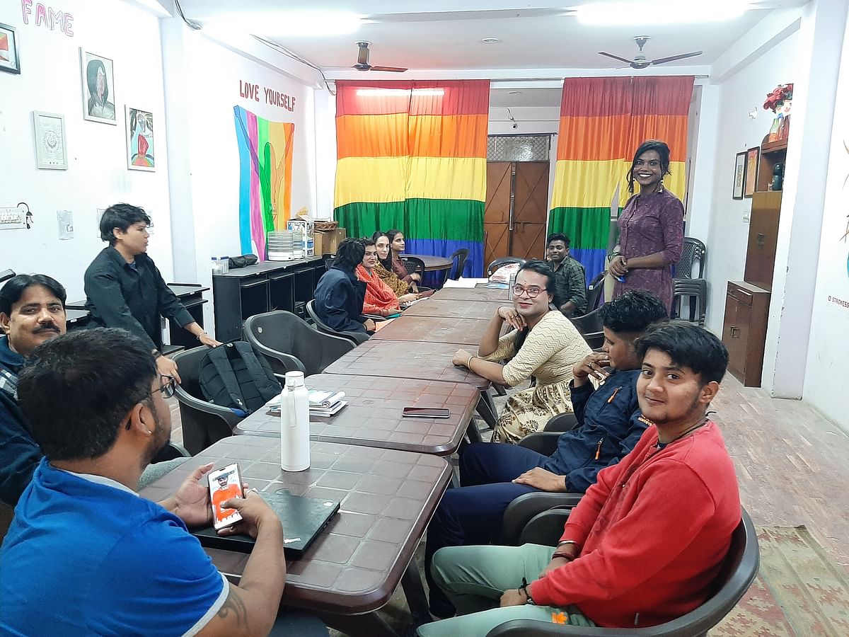 <div class="paragraphs"><p>Garima Greh residents and staff pose for a photo as they wait at the lunch table in their common room.</p></div>
