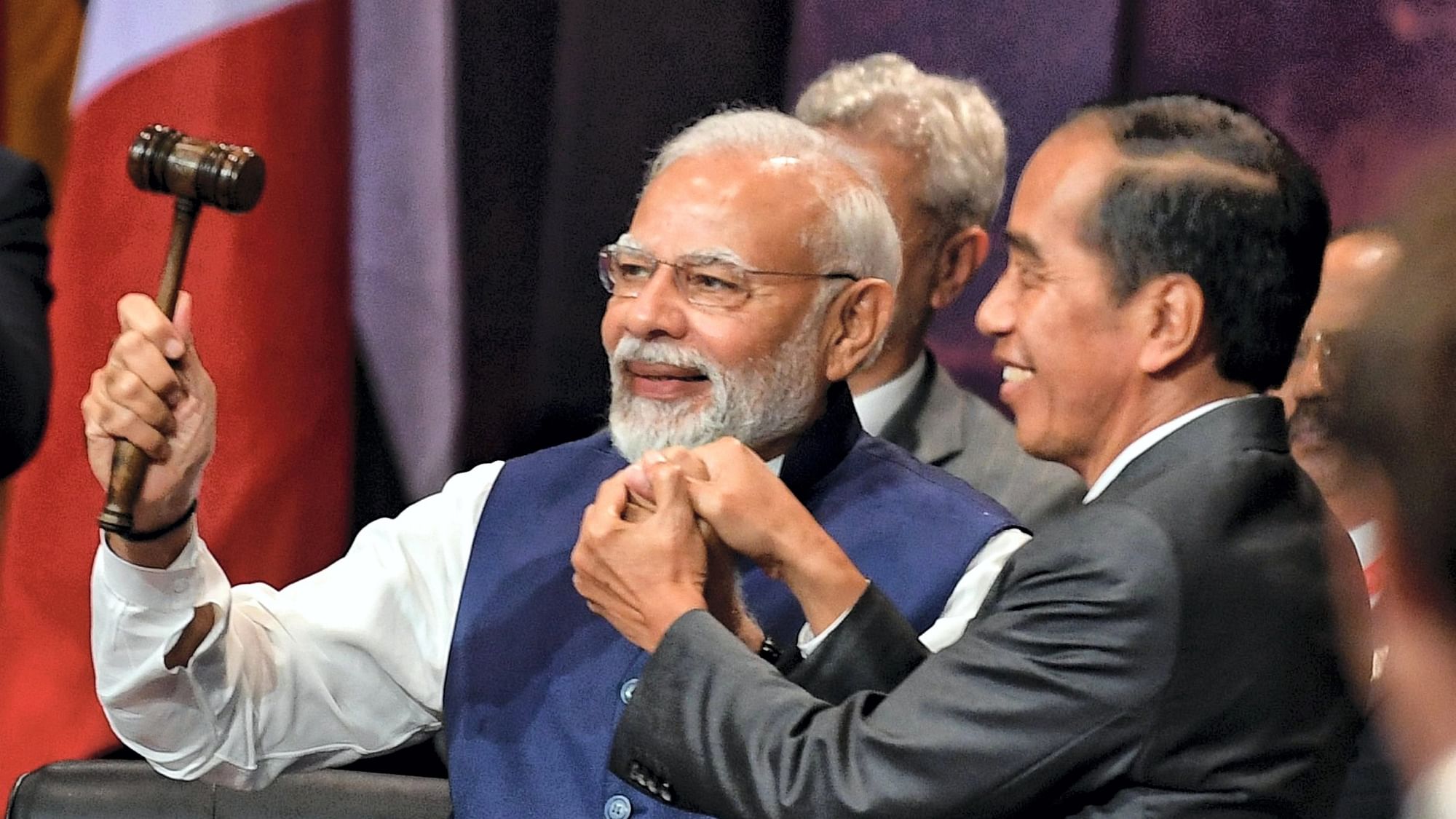 <div class="paragraphs"><p>Prime Minister Narendra Modi, left, and Indonesia's President Joko Widodo take part in the handover ceremony at the G20 Leaders' Summit, in Nusa Dua, Bali, Indonesia, Wednesday, 16 November 2022.</p></div>