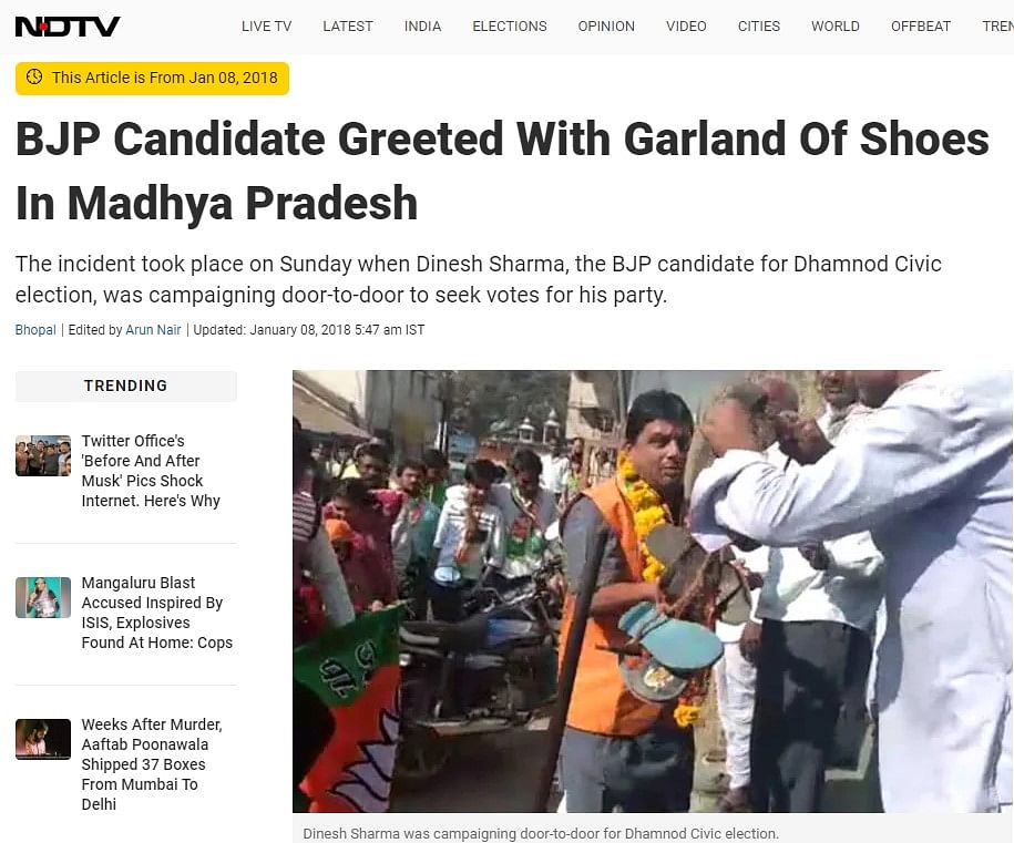 This video is from 2018 and shows BJP candidate Dinesh Sharma, who was garlanded with shoes by a local in MP's Dhar.