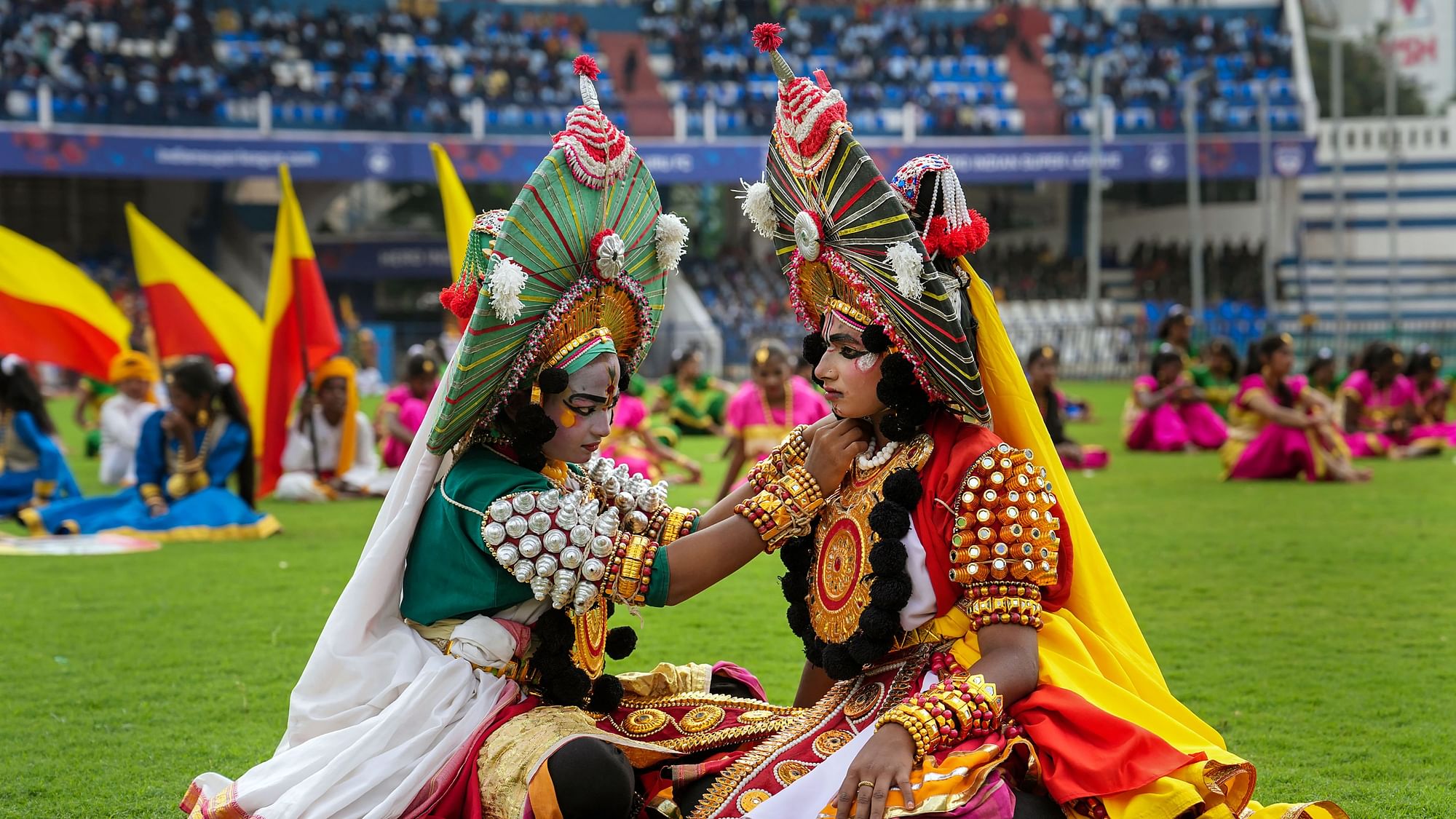 <div class="paragraphs"><p>Students dressed in Yakshagana theatre costume during the 67th Kannada Rajyotsava celebration at Kanteerava stadium in Bengaluru, Tuesday, 1 November.</p></div>