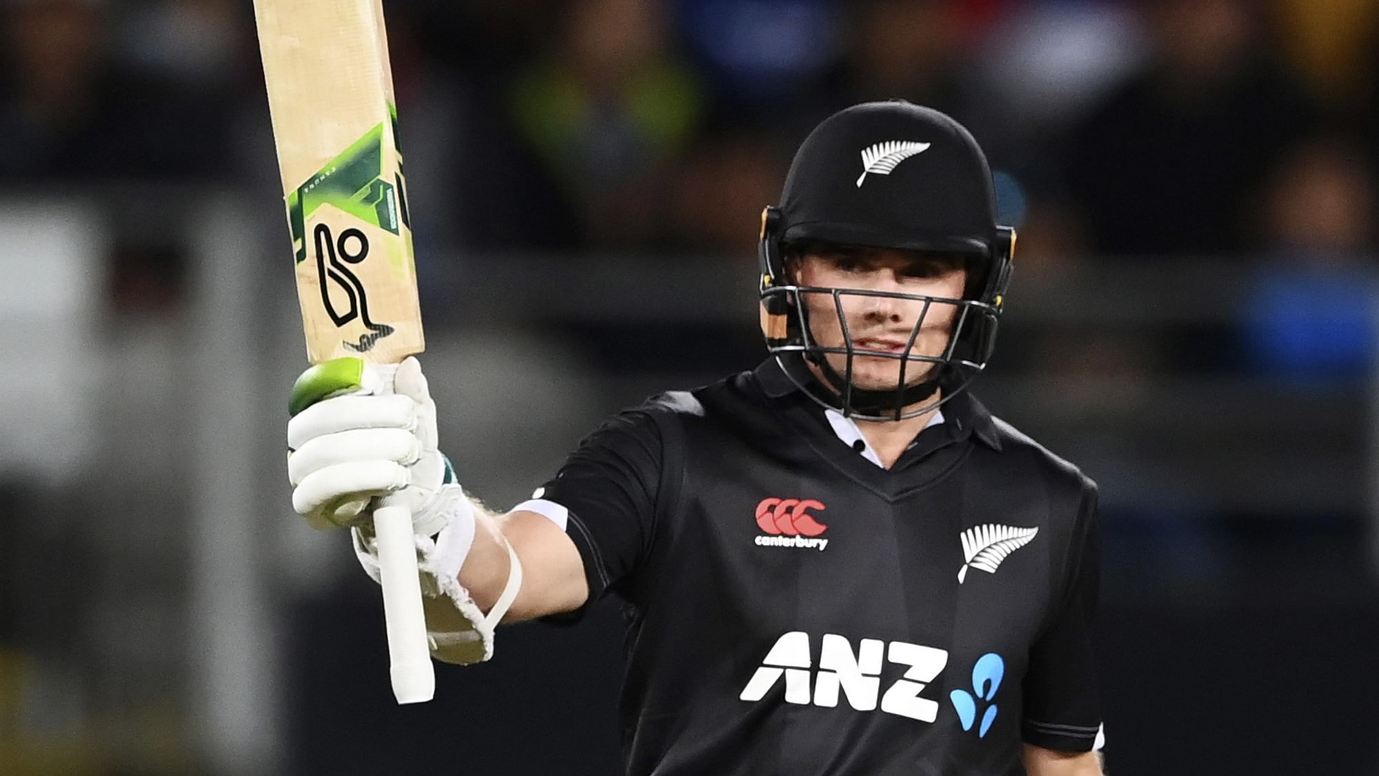 <div class="paragraphs"><p>New Zealand's Tom Latham raises his bat after making 50 runs against India during the 1st ODI.</p></div>