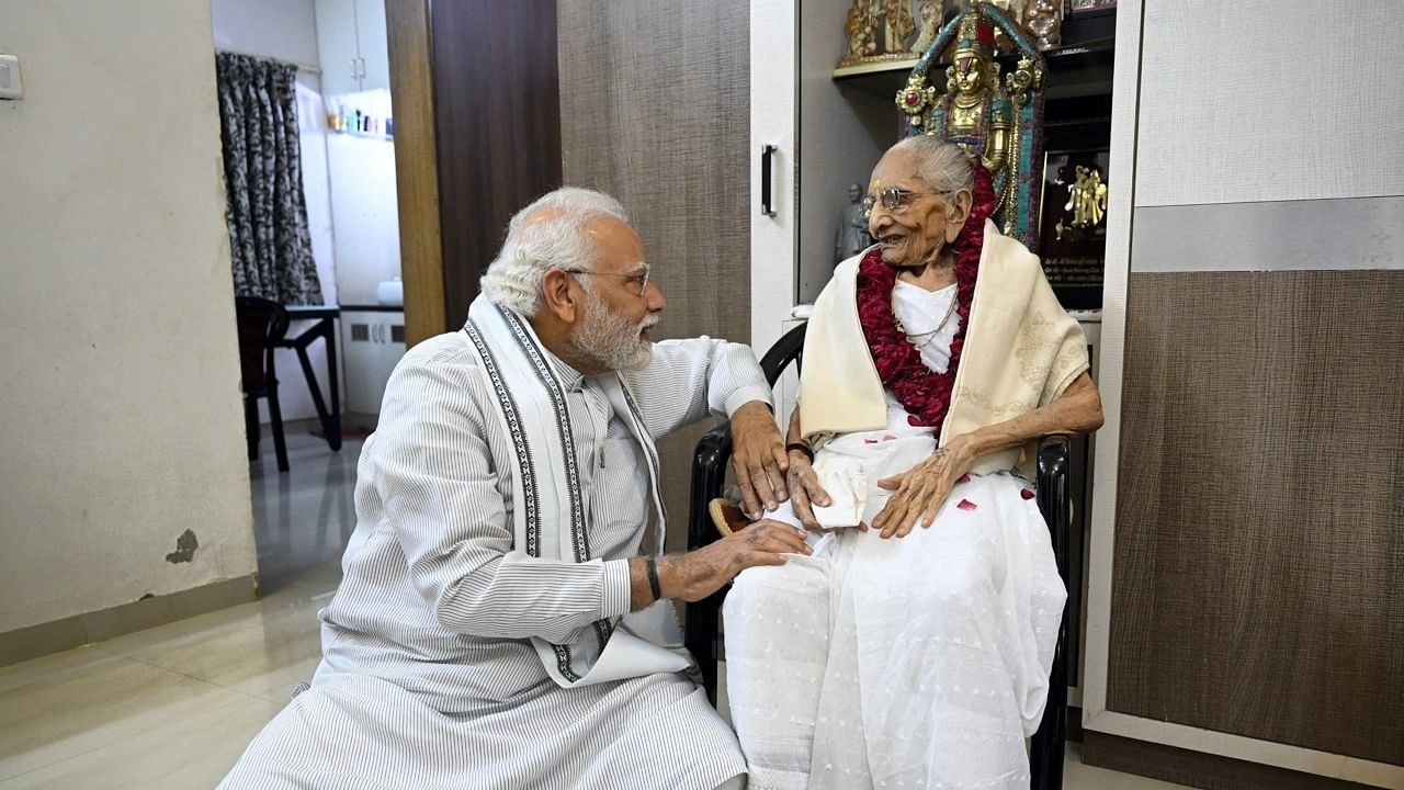 <div class="paragraphs"><p>Prime Minister Narendra Modi meets his mother Heeraba on her 100th birthday, in Gandhinagar.</p></div>
