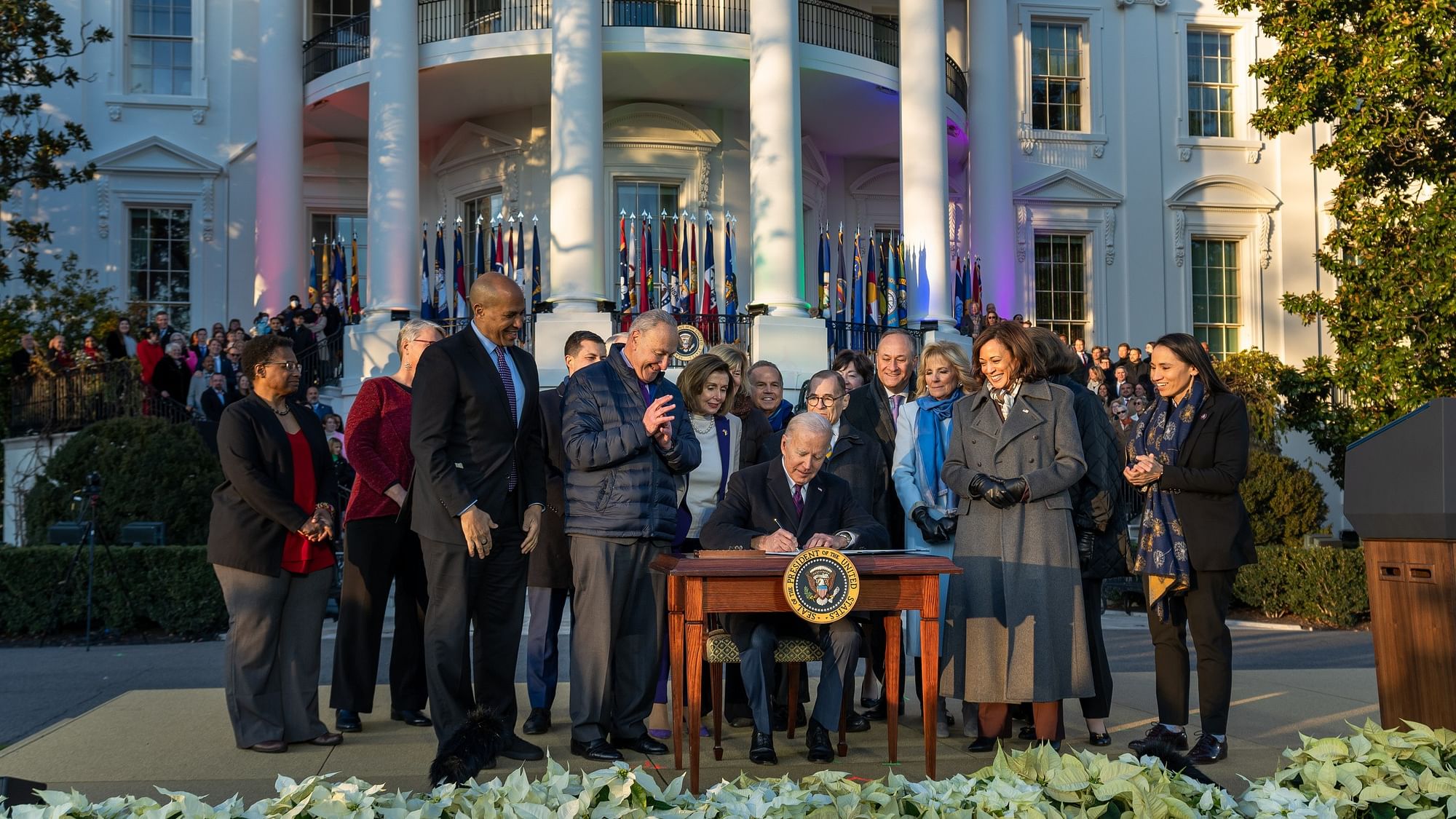 <div class="paragraphs"><p>US President Joe Biden signing the Respect for Marriage Act into law on Tuesday, 13 December.</p></div>
