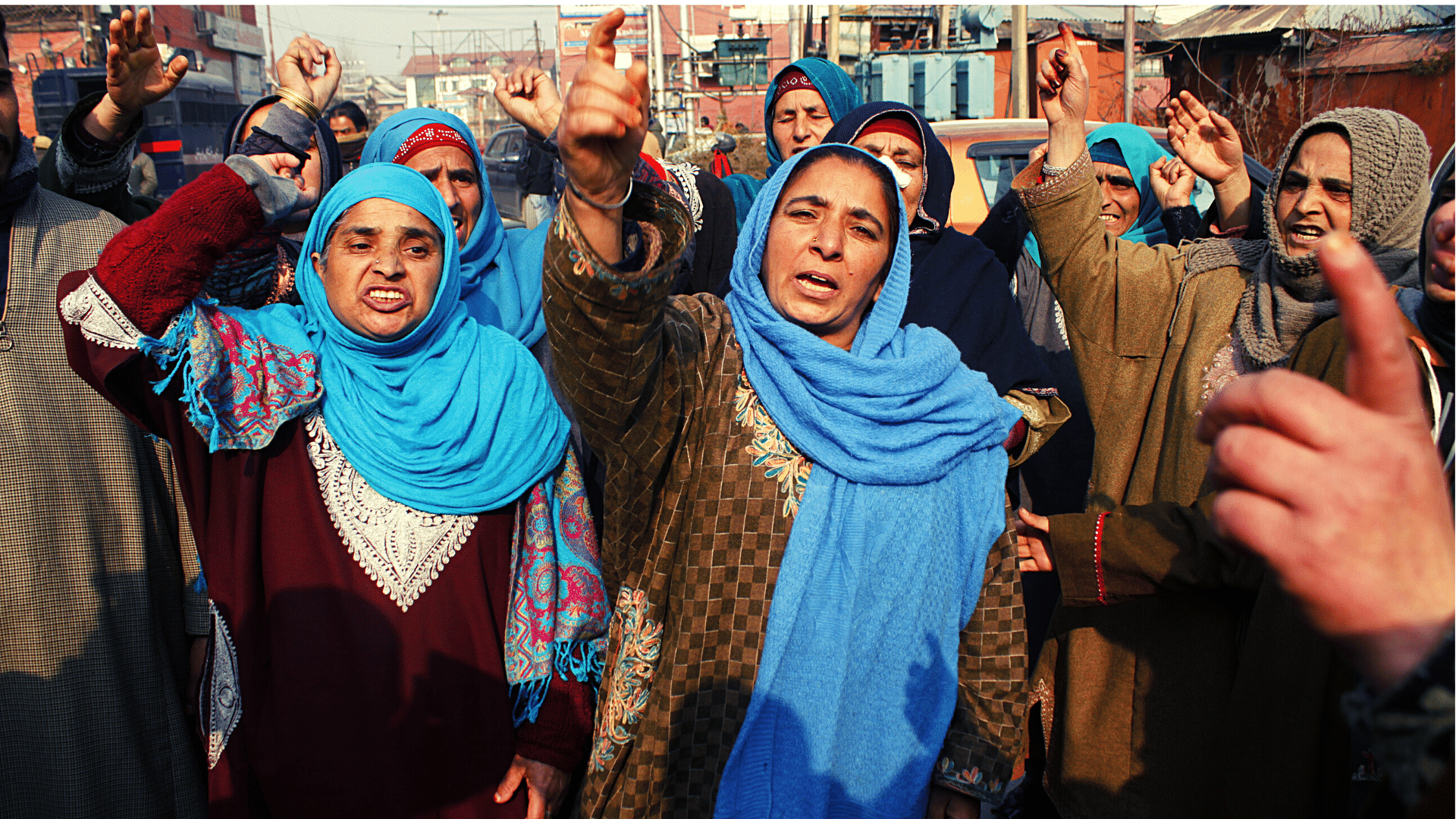 <div class="paragraphs"><p>Abdul Rashid Dar's family staging a protest against his disappearance.</p></div>