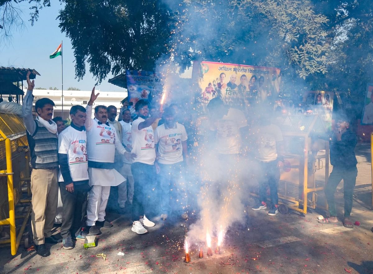 <div class="paragraphs"><p>New Delhi: Congress workers burn firecrackers celebrating the partys lead in Himachal Pradesh Assembly elections, at AICC headquarters.<br></p></div>
