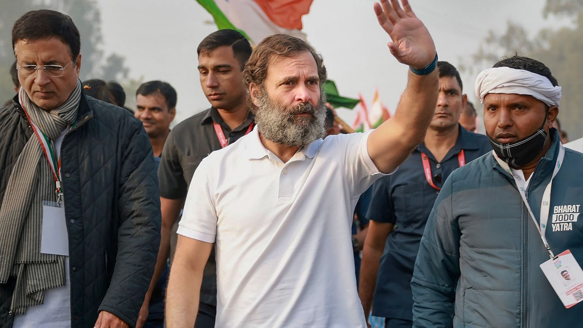 <div class="paragraphs"><p>Nuh: Congress leader Rahul Gandhi waves at supporters during the 'Bharat Jodo Yatra', in Nuh district, Thursday, Dec. 22, 2022. Congress leader Randeep Surjewala is also seen.</p></div>