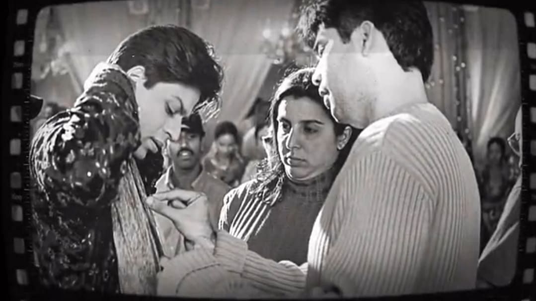 <div class="paragraphs"><p>Karan Johar with Shah Rukh Khan and Farah Khan from the sets of<em> Kabhi Khushi Kabhie Gham...</em></p></div>