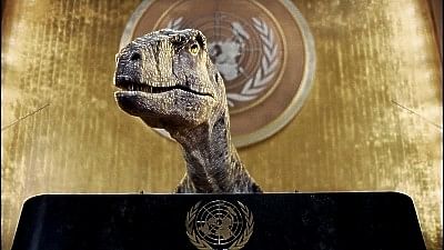 <div class="paragraphs"><p>Dinosaur at COP15 urges more climate action from global leaders.</p></div>