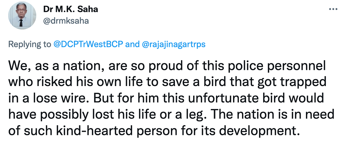 Suresh, the traffic cop, successfully rescued the bird that was stuck on the hoarding. 