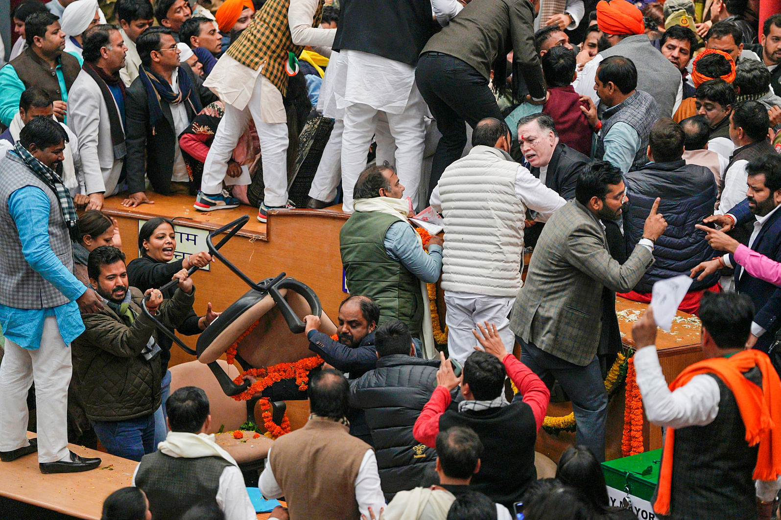 <div class="paragraphs"><p>New Delhi: AAP and BJP councilors clash during the election of Mayor and Dy Mayor at the Civic Centre, in New Delhi, Friday, Jan. 6, 2023.   </p></div>