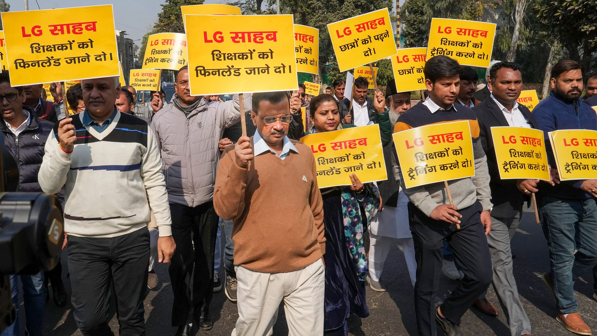 <div class="paragraphs"><p>Delhi Chief Minister Arvind Kejriwal with Deputy Chief Minister Manish Sisodia and other AAP MLAs during a protest march towards Delhi Lieutenant Governor VK Saxenas office over his alleged interference in the working of the city government, in New Delhi, on Monday, 16 January.</p></div>