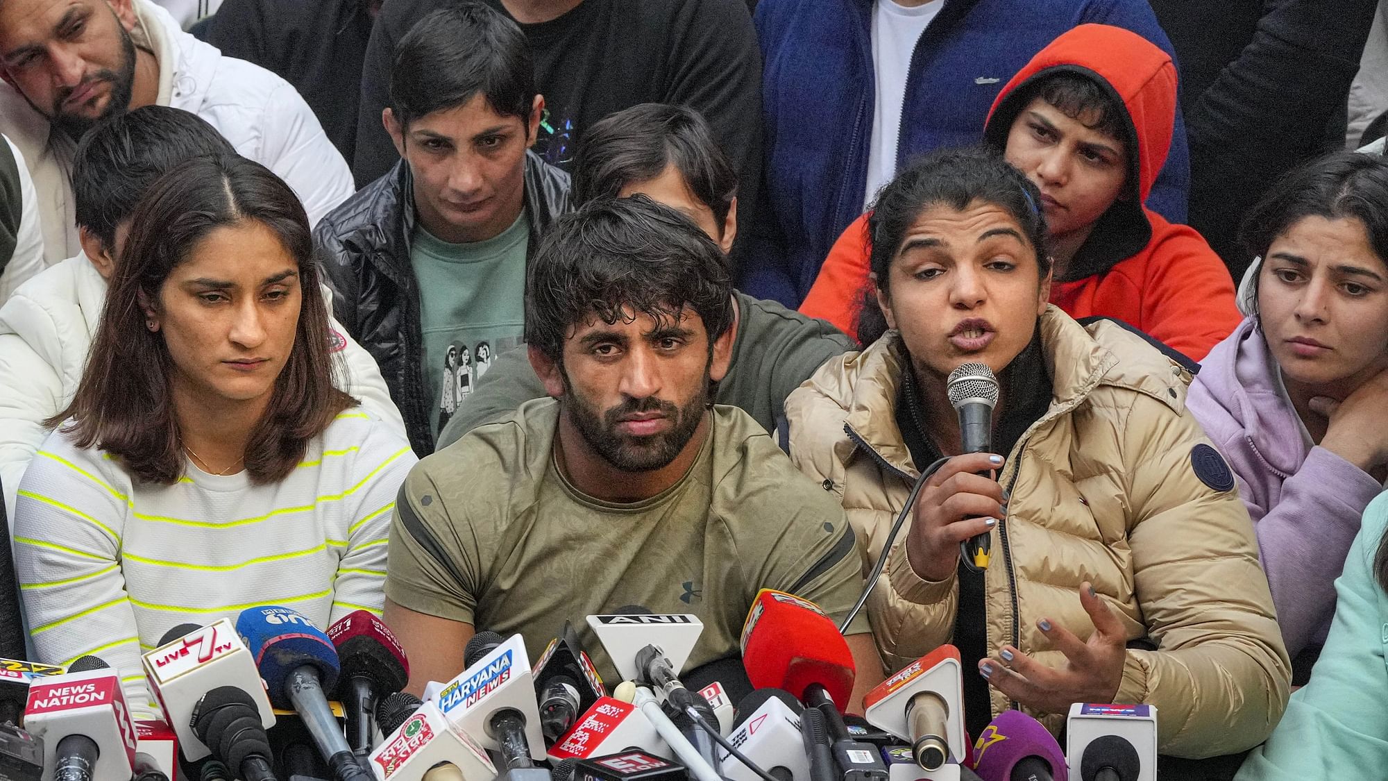<div class="paragraphs"><p>Wrestlers Vinesh Phogat, Sakshi Malik and Bajrang Punia address a press conference after a meeting with officials of Union Sports Ministry regarding their protest against the Wrestling Federation of India (WFI), in New Delhi, Thursday, 19 January.</p></div>