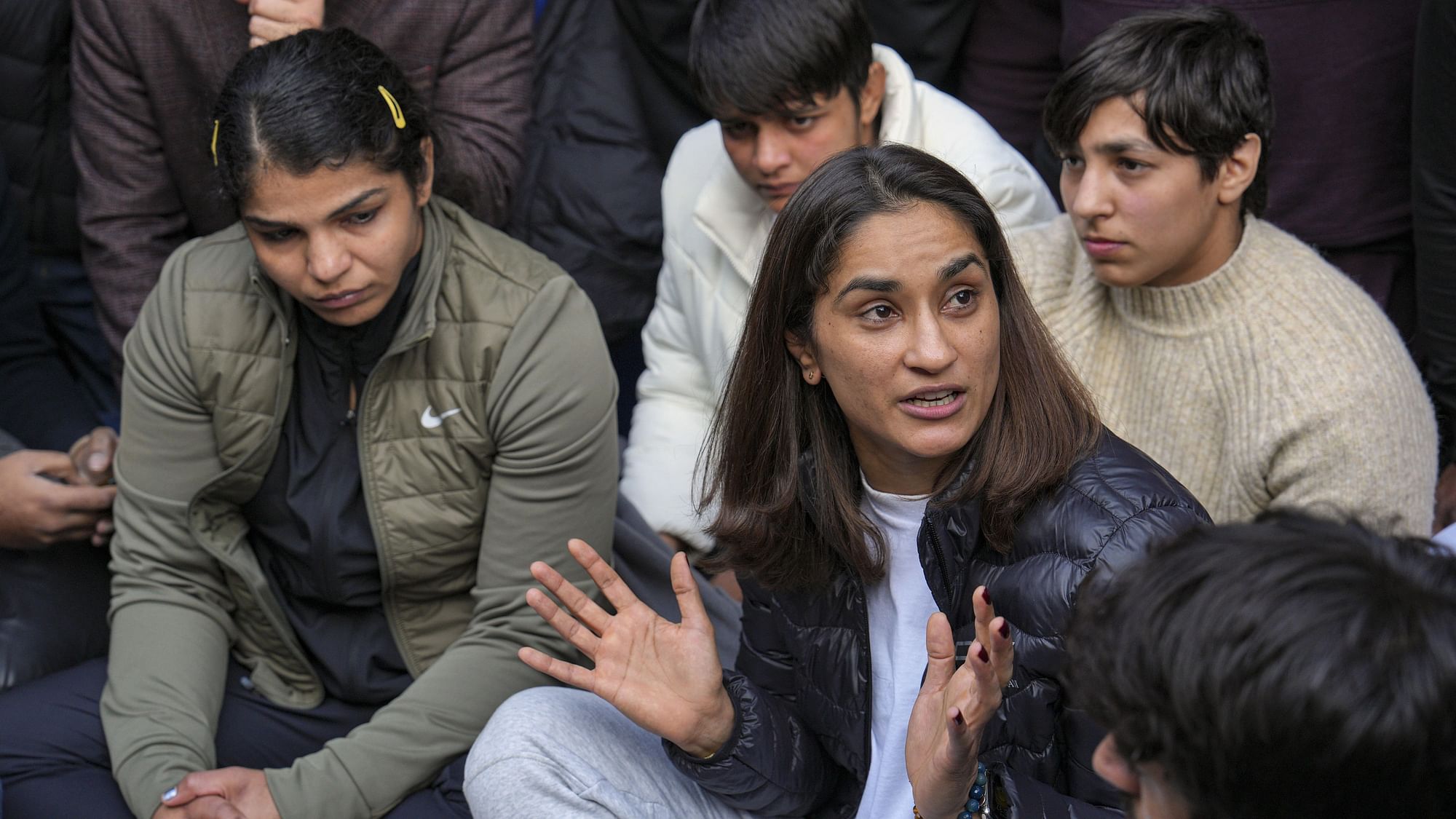 <div class="paragraphs"><p>Indian wrestler Vinesh Phogat with wrestler Sakshi Malik reacts during a press conference regarding wrestlers protest against the Wrestling Federation of India (WFI), in New Delhi, Wednesday,18 January.</p></div>
